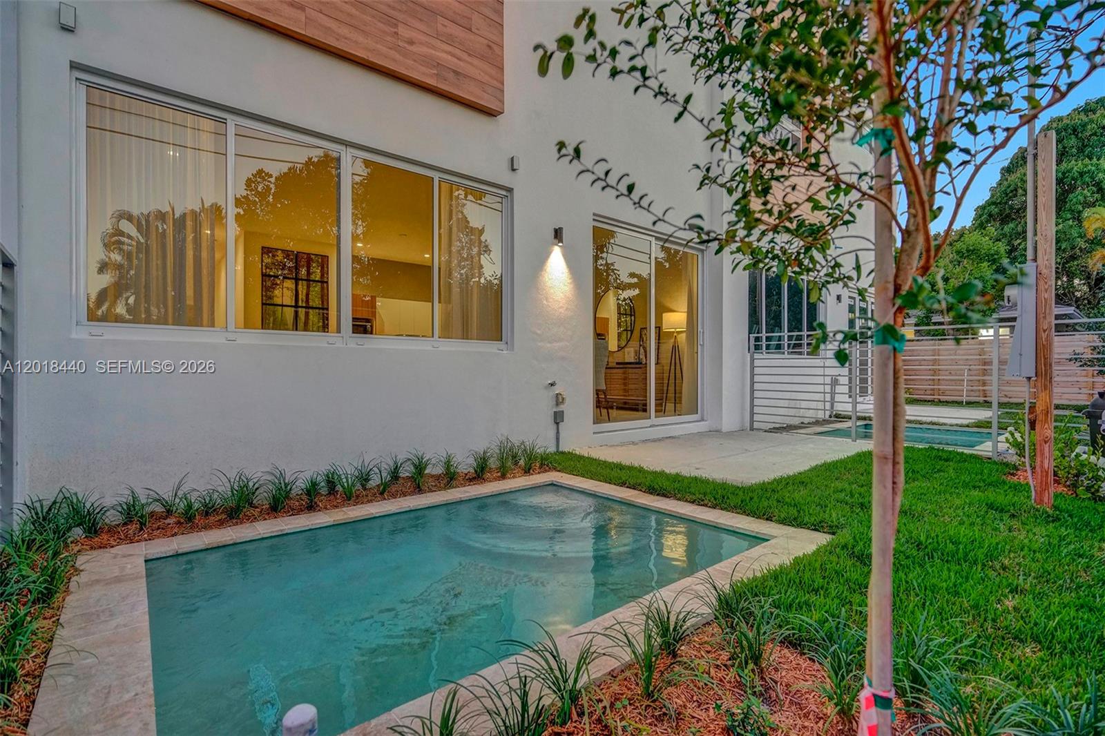 Located just east of Fort Lauderdale, Galleria Villages presents an exclusive collection of 24 brand-new residences. Thoughtfully designed with privacy and security in mind, this gated community offers a peaceful retreat for you and your family. Each home includes the option for a private pool, charming front yards ideal for barbecues and gatherings, and an inviting atmosphere for creating lasting memories. The contemporary open-concept layout features 10-foot ceilings, a two-car garage with automated doors, three en-suite bedrooms, a guest bathroom, a versatile den, and sleek stainless steel appliances. Don’t miss the chance to secure your home in this pre-construction development, with expected completion in Q2 2026.