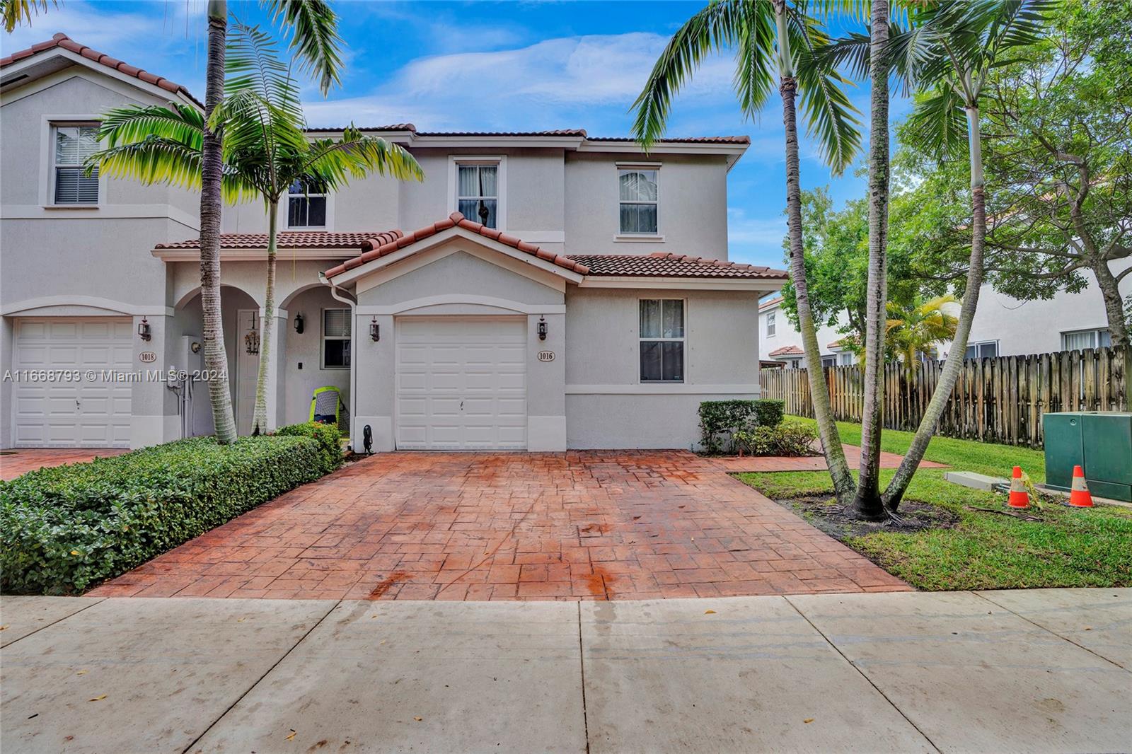 Stunning, spacious, and recently updated 4-bed 3-bath townhouse available in the tranquil, gated community of Ives Dairy Townhomes, Aventura. This beautiful home features a functional layout with 1 bed and 1 full bath in the first floor. The master bedroom boasts a walk-in closet and an oversized bathroom with both a tub and a shower. Each bedroom is equipped with custom-built closets. Modern kitchen with stainless steel appliances.  Separate laundry area with washer and dryer. Enjoy outdoor living in the private, fully fenced patio. The property also includes a 1-car garage and two additional driveway parking spots. Residents have access to the community pool and clubhouse, all within a few blocks of I-95 and just minutes away from Aventura Mall, supermarkets, top-rated schools, and more.