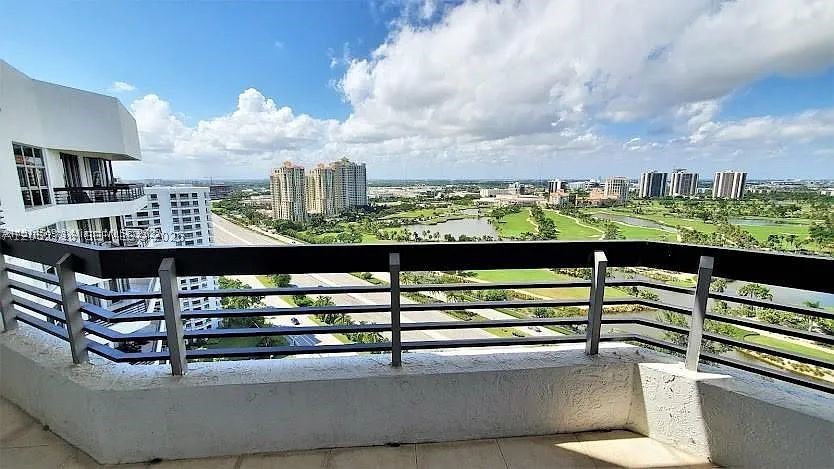 Stunning Penthouse Residence in the Heart of Aventura! Beautifully furnished PH unit featuring rich wood flooring throughout, an open-concept layout, and abundant natural light. The spacious living and dining area flows seamlessly into the kitchen with granite countertops, breakfast bar, and ample cabinet space, creating the perfect setting for everyday living or entertaining. The oversized primary suite offers a large walk-in closet and an updated bathroom with a glass-enclosed shower. Enjoy the convenience of in-unit washer and dryer, generous storage, and a well-maintained interior ready for immediate occupancy. Located in the prestigious Mystic Pointe community, residents enjoy resort-style amenities including a heated swimming pool, state-of-the-art fitness center, tennis and pickleball courts, lush landscaped grounds, 24-hour gated security, valet, concierge, marina, and beautifully maintained common areas. Just minutes from Aventura Mall, Turnberry Golf Course, top-rated restaurants, parks, houses of worship, Sunny Isles Beach, and major highways. Available furnished and move-in ready. Don't miss this opportunity!