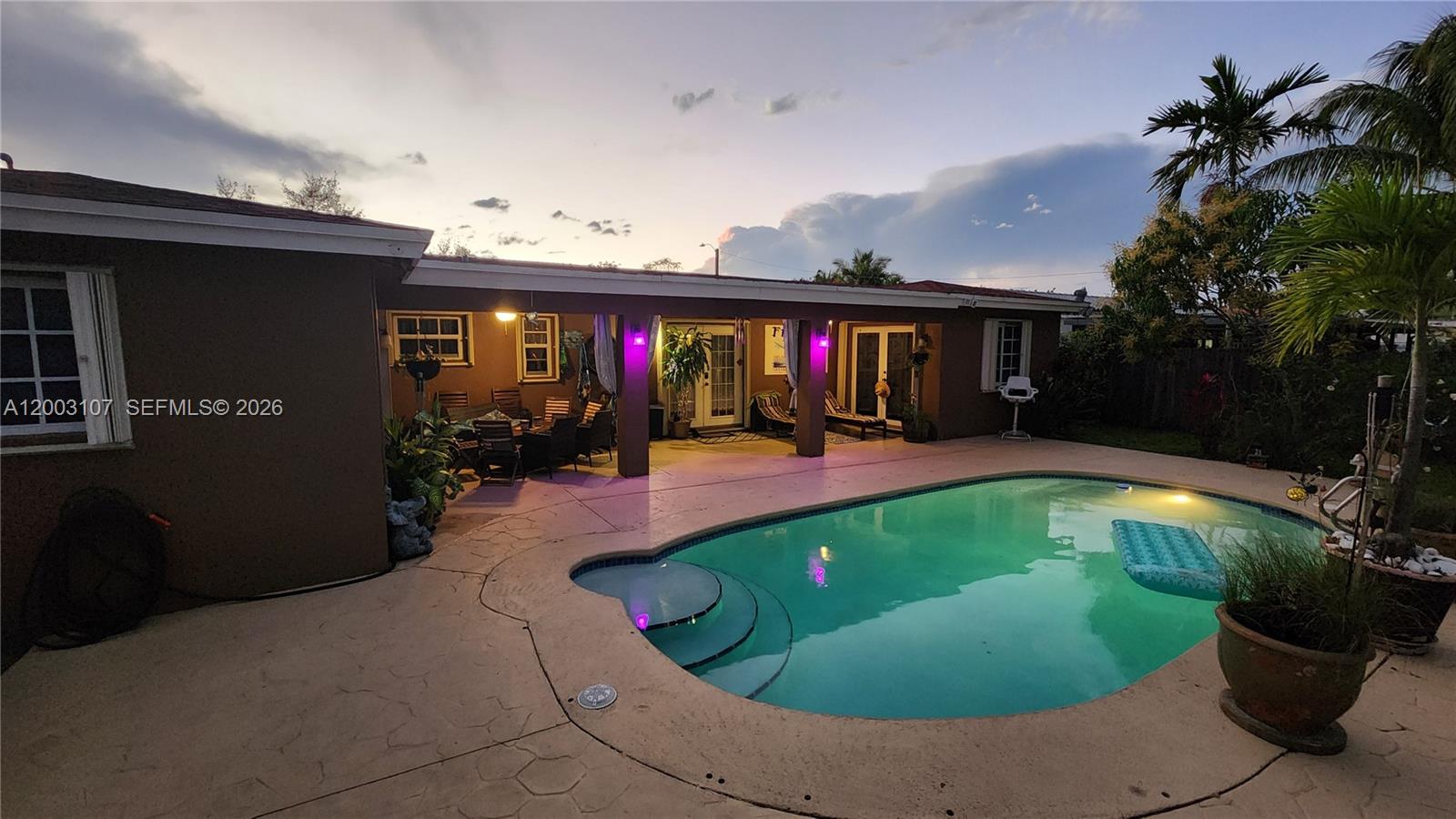 Tastefully renovated 3-bedroom, 2-bathroom single-family home with a pool and over 2,200 sq ft of living space in Cutler Bay. This move-in-ready residence features a beautifully updated interior with new flooring, lighting, doors, fresh interior paint, and fresh exterior paint. The home also offers a brand-new kitchen, renovated bathrooms, and new appliances including the refrigerator, range, washer, dryer, water heater, pool pump, and HVAC unit. The fully gated property includes accordion shutters and lush tropical landscaping, fruit trees, and exotic plants, creating a private backyard oasis. Located in a wonderful community with events throughout the year and excellent nearby school options.