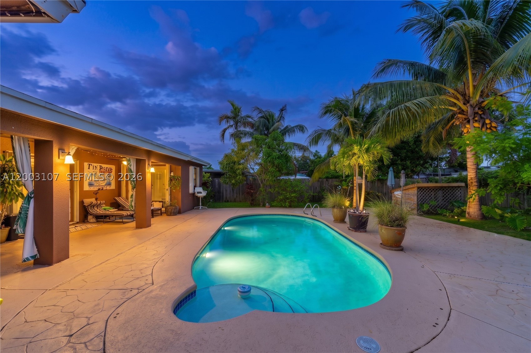 Tastefully renovated 3-bedroom, 2-bathroom single-family home with a pool and over 2,200 sq ft of living space in Cutler Bay. This move-in-ready residence features a beautifully updated interior with new flooring, lighting, doors, fresh interior paint, and fresh exterior paint. The home also offers a brand-new kitchen, renovated bathrooms, and new appliances including the refrigerator, range, washer, dryer, water heater, pool pump, and HVAC unit. The fully gated property includes accordion shutters and lush tropical landscaping, fruit trees, and exotic plants, creating a private backyard oasis. Located in a wonderful community with events throughout the year and excellent nearby school options.