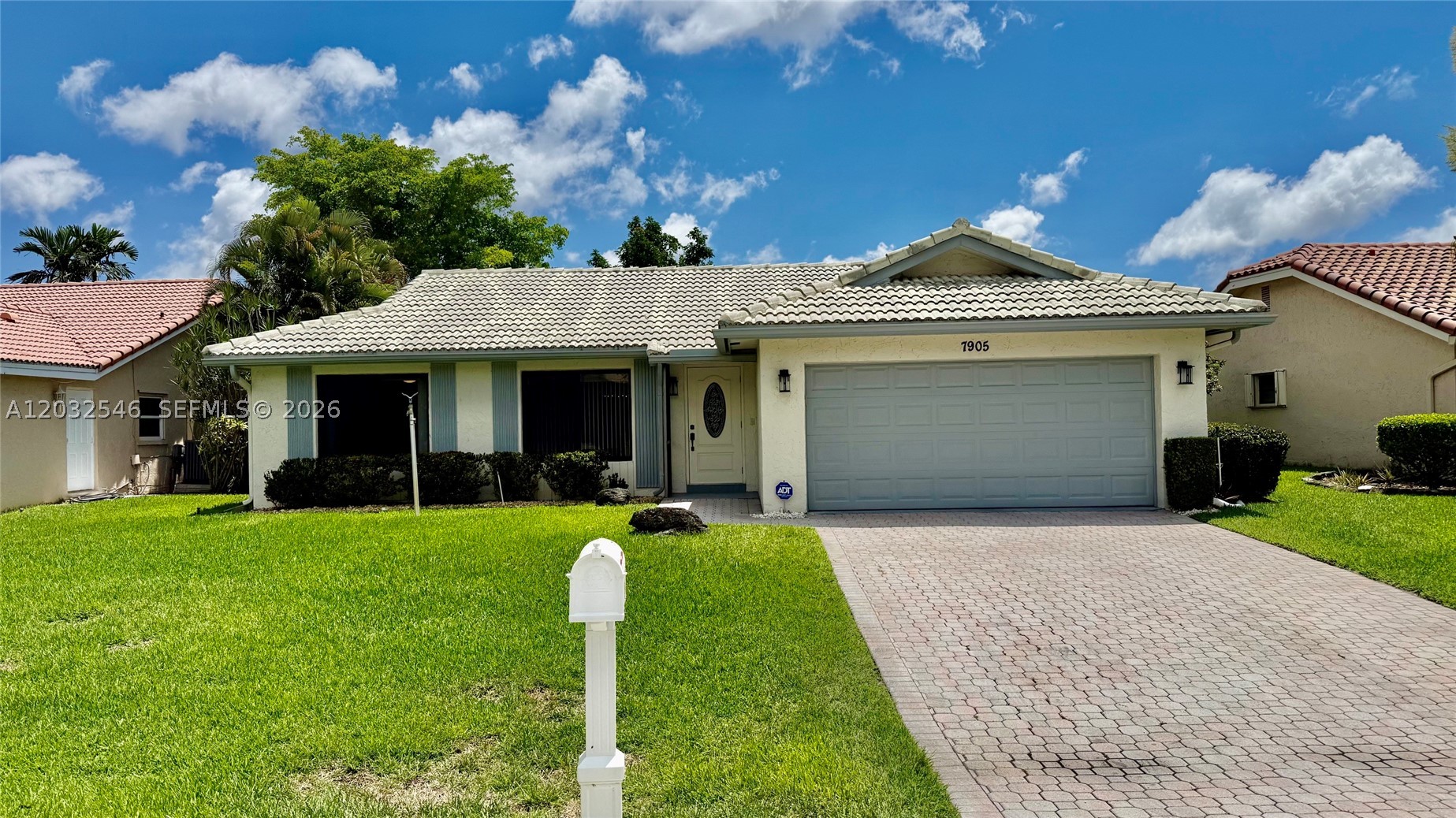 Welcome to this beautifully maintained 2-bedroom, 2-bath single-family home located in the highly desirable 55+ community of Cloverfield in central Boca Raton. This residence offers bright, open living spaces enhanced by vaulted ceilings, abundant natural light, and a seamless flow ideal for both relaxing and entertaining. The home has large living and dining spaces.  The Florida room off the kitchen opens to an updated screened window patio overlooking a private backyard—perfect for morning coffee or evening unwinding. The spacious primary suite includes a walk-in closet and an ensuite bath with dual sinks and a step-in shower.  A generously sized guest bedroom provides flexibility for visitors, an office, or a hobby room. Additional highlights include an interior laundry room, a 2-car garage, and new hurricane impact windows and doors. Cloverfield is known for its low HOA fees and exceptional maintenance program, including lawn care, basic cable, exterior painting, and scheduled roof cleaning. Residents enjoy a heated community pool, hot tub, clubhouse, and a welcoming neighborhood atmosphere. Pets are welcome with no restrictions, and only one owner must be 55+.Ideally located just minutes from Town Center Mall, FAU, Mizner Park, beaches, grocery stores, medical centers, houses of worship, and major highways—this home offers the perfect blend of comfort, convenience, and active-adult living. Property is being sold as-is.
