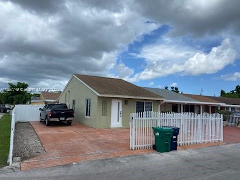Beautifully renovated one story townhome on corner lot!  No HOA and private block