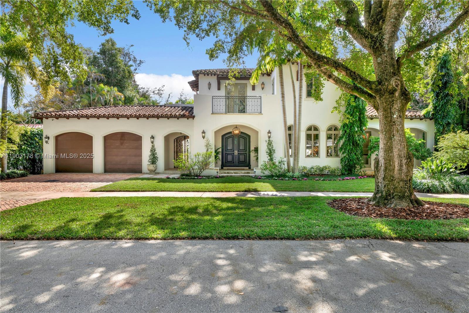Coral Gables classic with a modern twist. This exquisite  2011 custom-built home blends timeless elegance with today’s smart home features. Perfect for both everyday living and entertaining, with living, family, and main bedroom opening to a tropical pool and patio through French doors. Main bedroom and guest suite downstairs and two ensuite bedrooms upstairs, separated by a loft and balcony. Exceptional finishes throughout include Brazilian cherry wood floors, marble accents, custom Hector & Hector kitchen, impact windows/doors, Crestron system, water purification, and generator. Located on a vivid tree-lined street in the prestigious Golden Triangle, just steps from The Biltmore Hotel.
