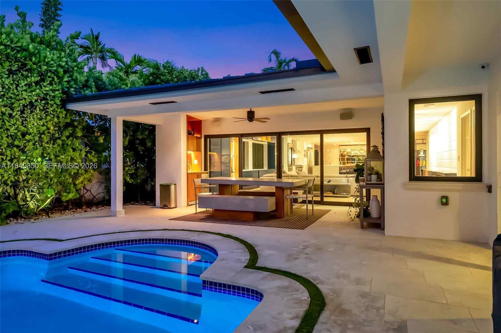 NEW PRICE ADJUSTMENT! Welcome to this professionally designed, one-story residence offering 4,000 sq ft of refined living. This reimagined 5-bedroom, 5-bath home by Dida Homes is ideally located in the coveted, walkable South Bayshore neighborhood—just moments from Lincoln Road, the golf course, the new 19 acre Bayshore Park, Sunset Harbour, and the beaches.

A discreet, understated exterior gives way to a striking, design-forward interior—delivering a true wow factor while offering the utmost privacy for a discerning owner. 

This modern transformation offers all the luxuries of new construction without the premium price tag. Features include a heated pool, impact windows and doors, a 2023 metal roof, a 2-car air-conditioned garage, dedicated laundry room, and an expanded chef’s kitchen with Viking appliances. Smart living is elevated with Savant home automation, motorized window treatments, integrated indoor/outdoor speakers, and a full security camera system.

Outdoors, an upgraded deck, limestone pavers, illuminated pergola, and mosquito misting system create a serene and private retreat ideal for entertaining or relaxing.

As featured in Florida Design Magazine, this home is the definition of turnkey luxury.

Available fully furnished and equipped, if desired, for added convenience and value.