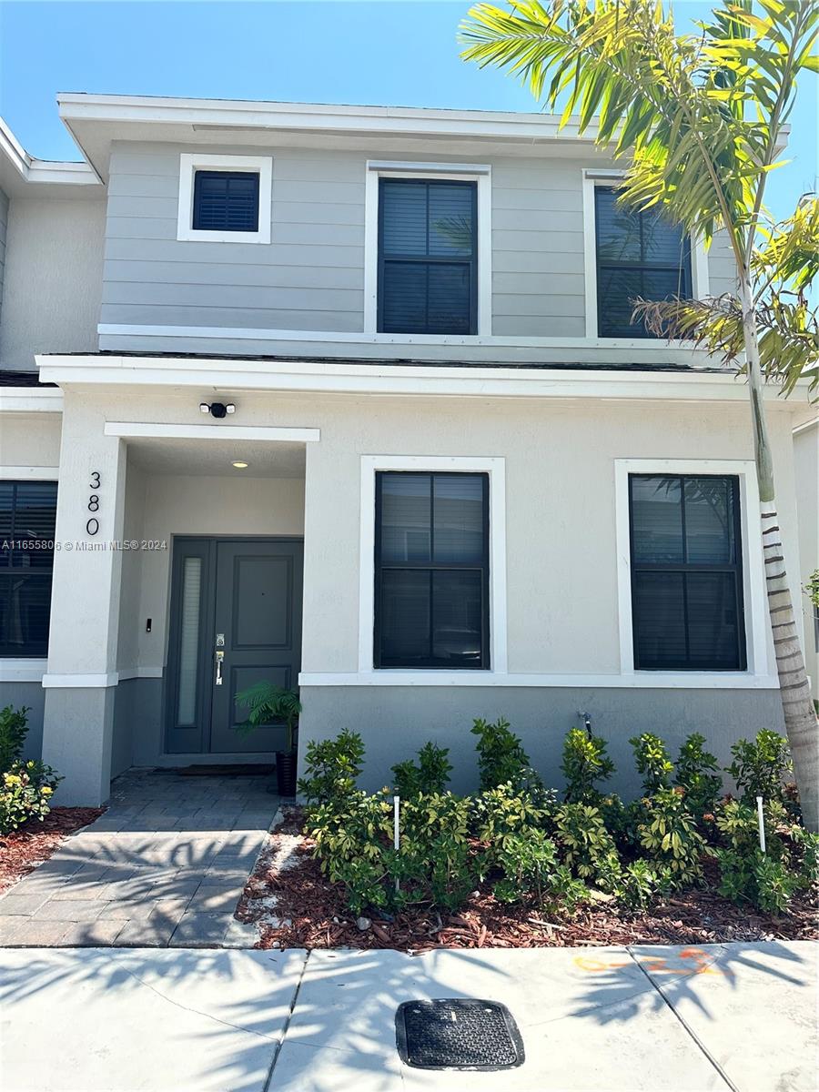 BRAND NEW Corner Unit townhouse. Ready to move in beautiful 3 Bedrooms 2.5 Bath. Ground floor, ceramic  tile, kitchen w/large island, features stainless steel appliances. 2 assigned parking spaces. Prime location, with immediate access to major highways and shopping. New blinds through the home, fans & smart home system. Fenced in backyard. Washer/Dryer. Does not require association approval.