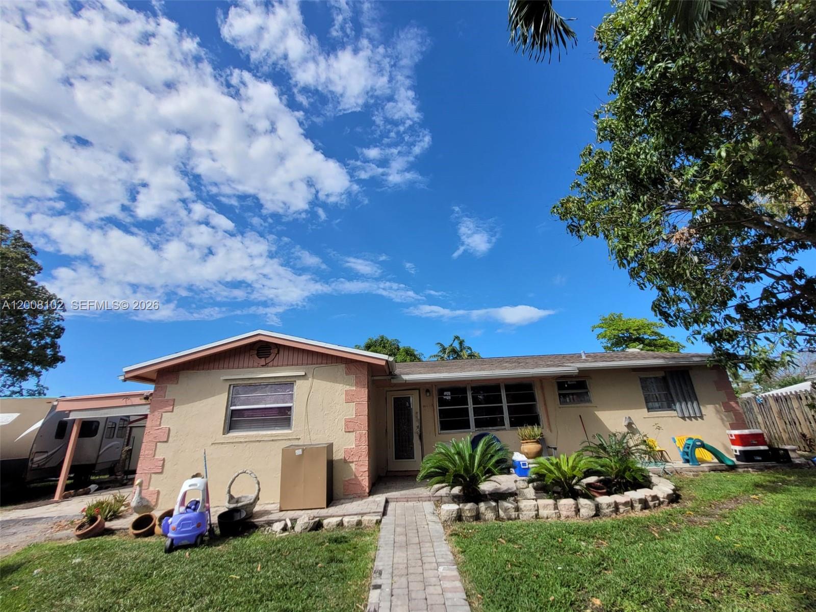 Great opportunity with a spacious lot offering plenty of room for a boat or RV. Property features a 2020 roof and 2021 A/C. The main home includes 3 bedrooms and 2 bathrooms, plus 1 bed/1 bath unit with private entrance—ideal for extended family or potential rental income. Property is being sold as-is and needs TLC, but offers great potential.