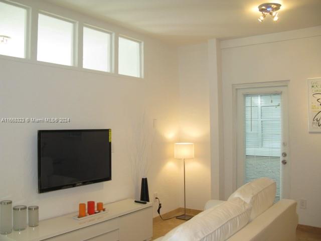 Great furnished unit located on the 1st floor. Queen bed in bedroom. Modern and contemporary furniture. LCD high definition 42 inches tv. All furniture included. Easy to show. Washer and Dryer in the building.