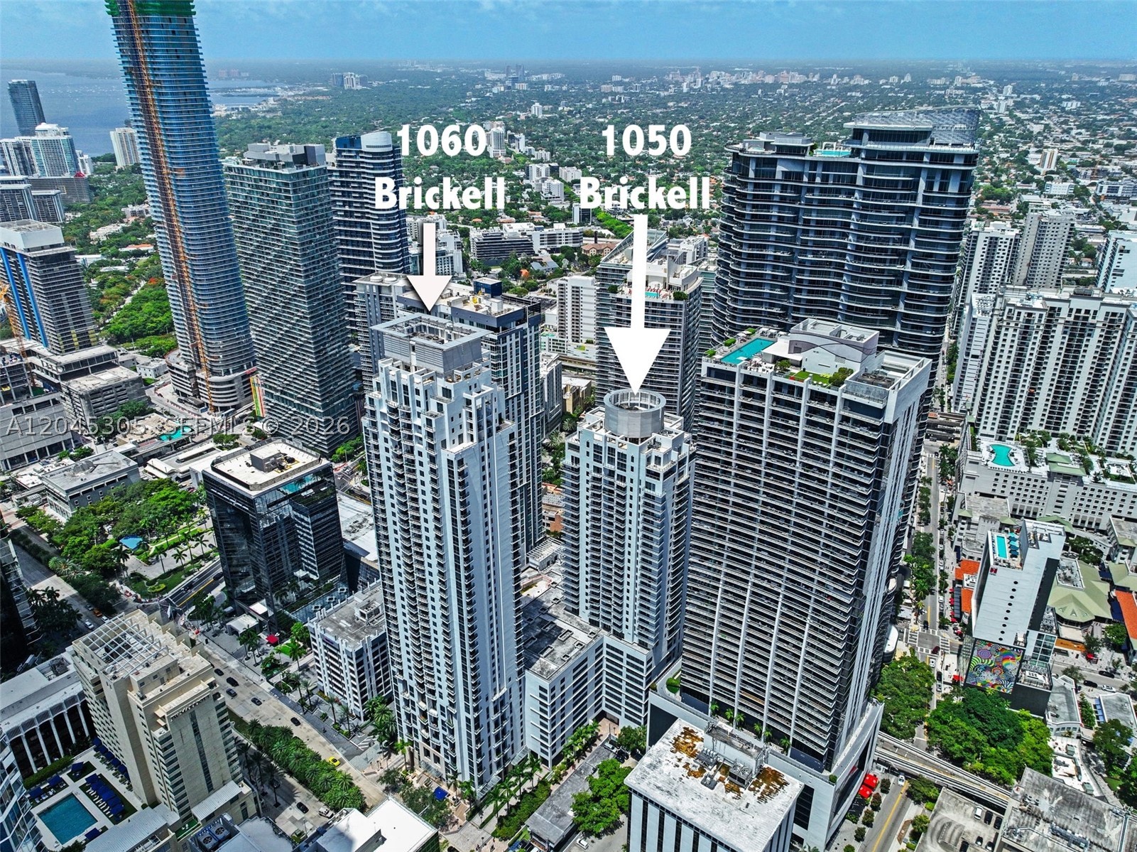 Corner unit featuring two bedroom, two-and-a-half bath condominium at 1050 Brickell Avenue, providing an elegant 1,278 sq ft space ready to move into in prime Brickell. Corner high floor unit enjoys abundant light with marble floors giving it continuity and modern design through the entire residence from entrance to bedrooms. Master bedroom boasts impressive vaulted ceilings creating more space and giving unique architectural look of the unit. Large living room and dining area are ideal both for relaxing and entertaining, with multiple exposures making city and skyline views part of your daily routine. The split floor plan provides extra privacy and two full baths plus a guest bathroom make hosting guests an easy task. 1050 Brickell puts you right in the middle of everything with easy access to Brickell City Center, Mary Brickell Village, restaurants, cafes, shopping and transportation but keeps it private enough not being bothered by it. Plus one assigned parking spot makes this lifestyle condo complete.