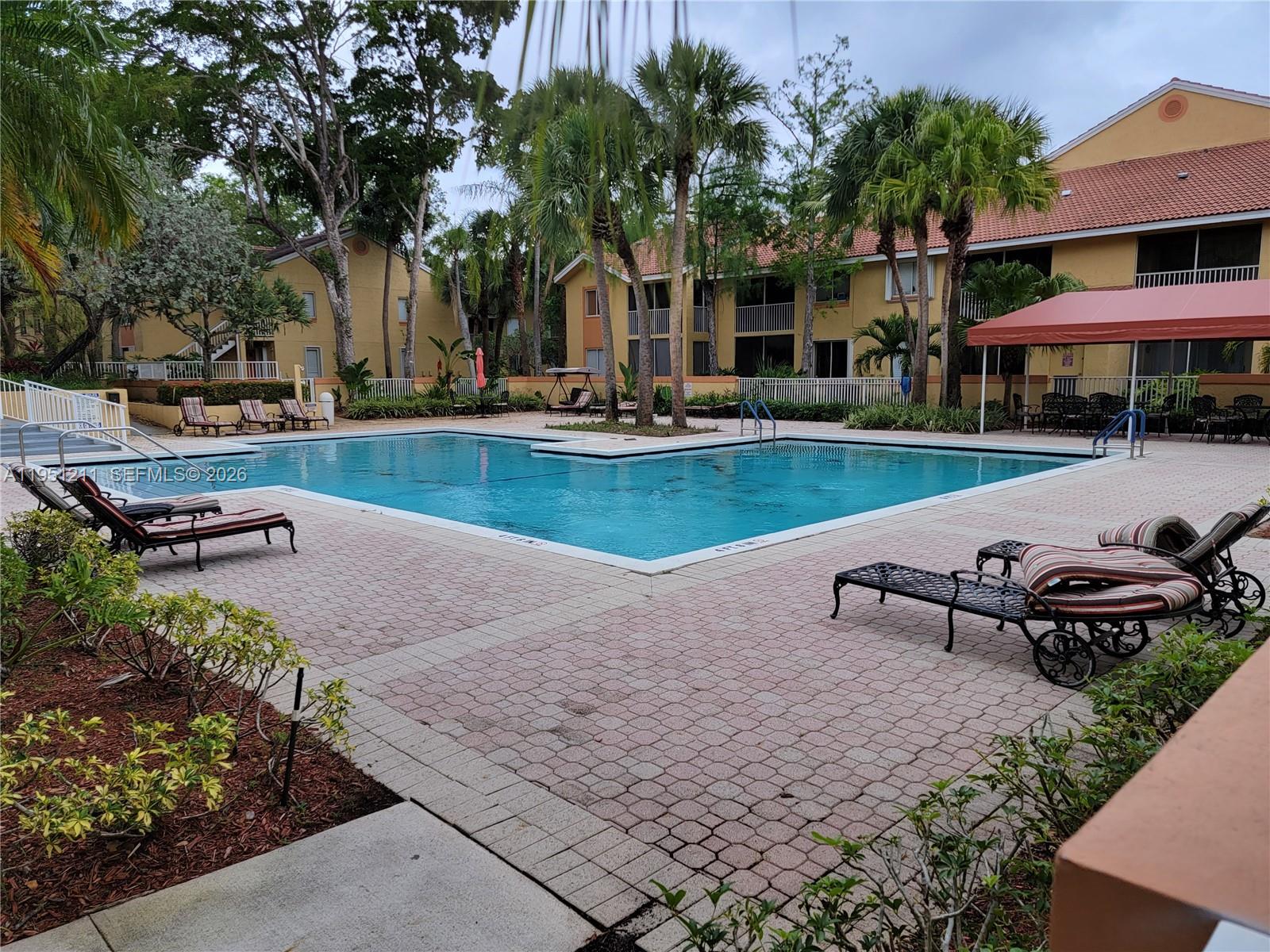 NAPOLI GARDENS AT CORAL S - Residential