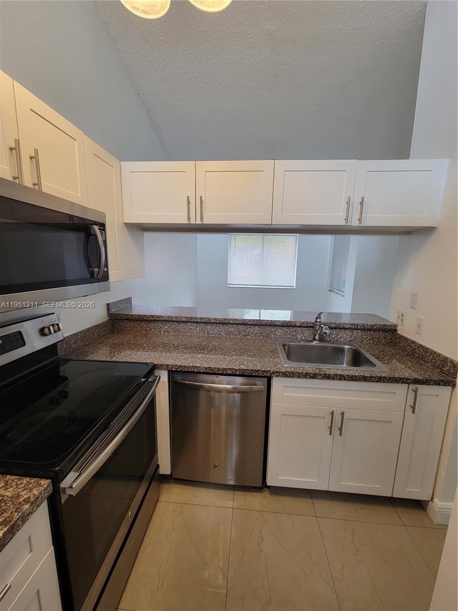 NAPOLI GARDENS AT CORAL S - Residential