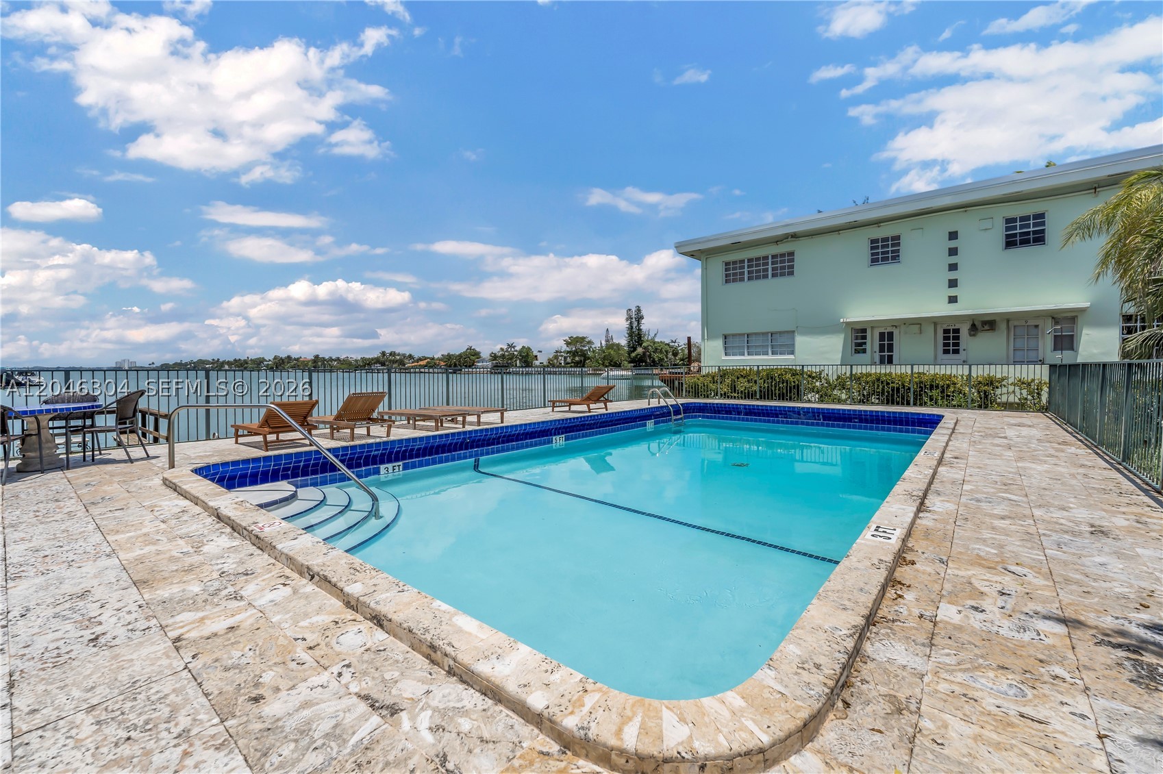 Welcome to a beautifully reimagined 1BD/1BA retreat in one of Miami Beach's most desirable and rapidly appreciating pockets — North Shore. Fully renovated top to bottom, blending modern finishes with the timeless charm of a classic MiMo waterfront building.
Open-concept layout with luxury vinyl plank flooring, recessed lighting, and abundant natural light. The remodeled galley kitchen features white shaker cabinetry, quartz countertops, marble-look backsplash, gas range, and stainless undermount sink. Spacious bedroom with dual closets. Spa-inspired bath with floor-to-ceiling marble-look tile, oversized walk-in rain shower, and designer fixtures. In-unit washer/dryer, smart keypad entry, and plantation shutter doors throughout.
Set within a gated, landscaped waterfront community on the canal with a bayfront pool, private dock with open-water views, and lush tropical courtyard. Secured intercom entry.
Moments from North Shore Open Space Park, the beach, Bal Harbour Shops, and Collins Ave dining — with quick access to I-195 and Downtown Miami.
Ideal for an owner-occupant or investor.