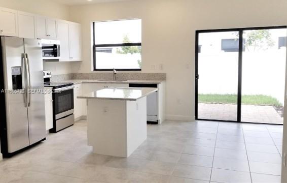 AQUABELLA SECTION TWO - Residential Lease