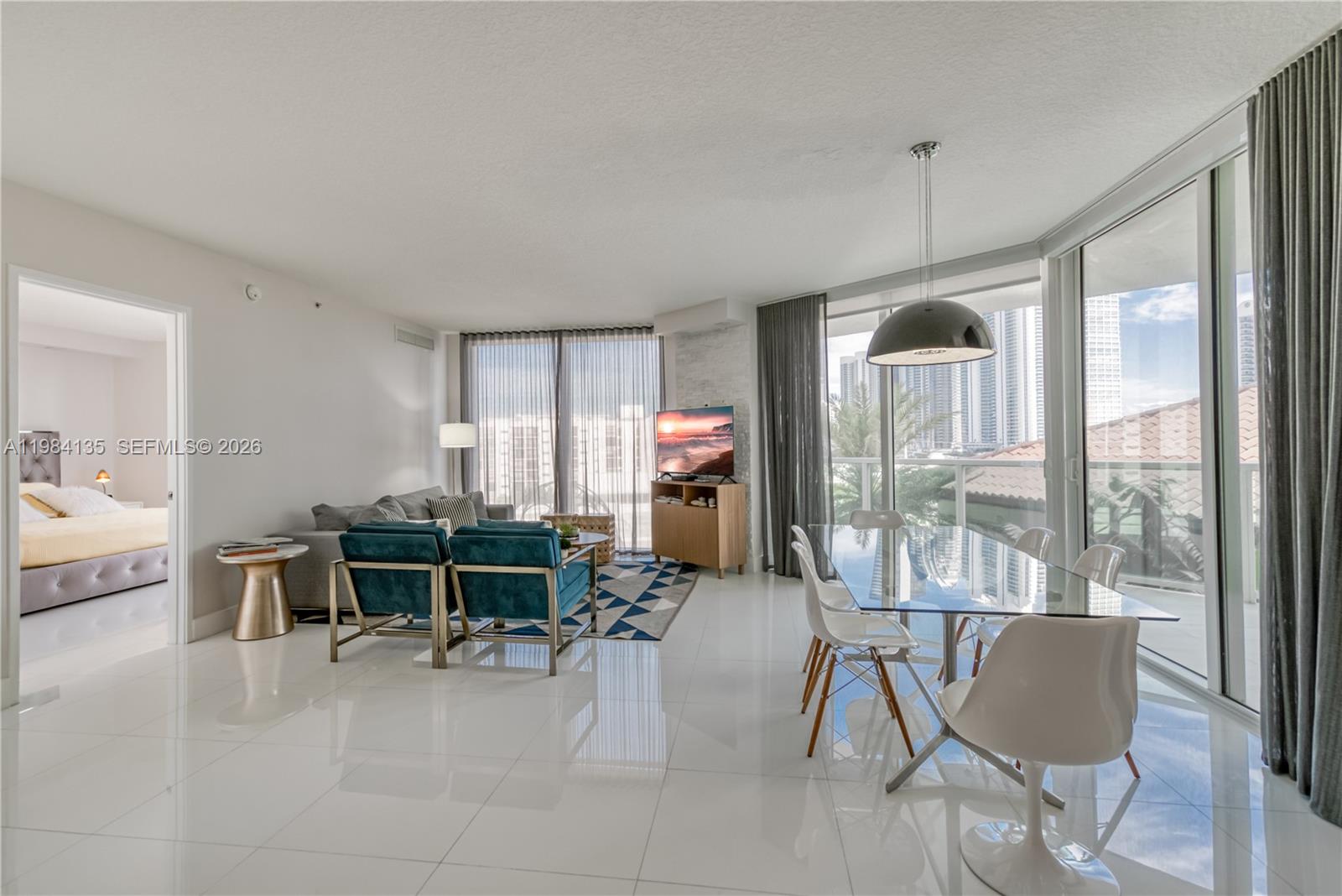 Location location location, on Collins Ave! There are partial ocean views in this beautiful 3 bedroom / 2 bath featuring partial water/city views. It is fully furnished, with impact glass windows, a large wrap-around balcony, a walk-in closet, and a fully equipped open kitchen. Basic cable & water included, washer/dryer in unit. It is turn-key and ready to move in! Canal access & one block from the ocean. The building offers great amenities like a clubhouse, gym, spa, pool, private beach club membership, and 24-hour valet/security services. 1 assigned parking space, plus valet parking. The building also has a pedestrian promenade with small shops including restaurants, spas, a pet store/grooming & a park across the street.