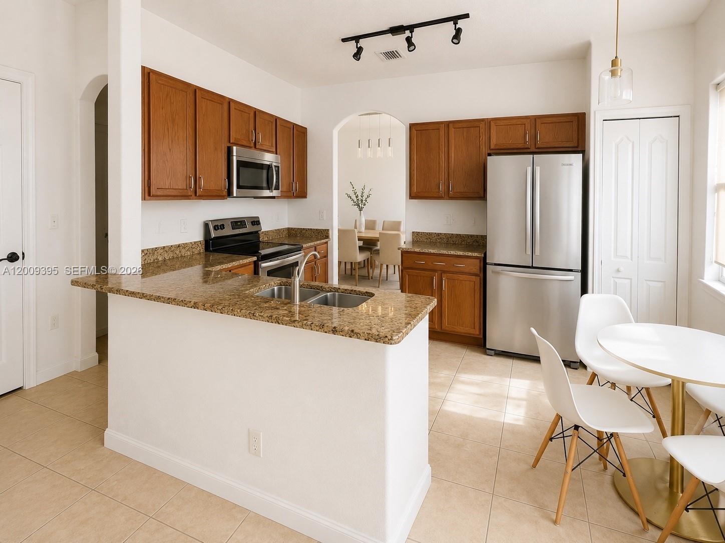 ISLANDS AT DORAL TOWNHOME - Residential