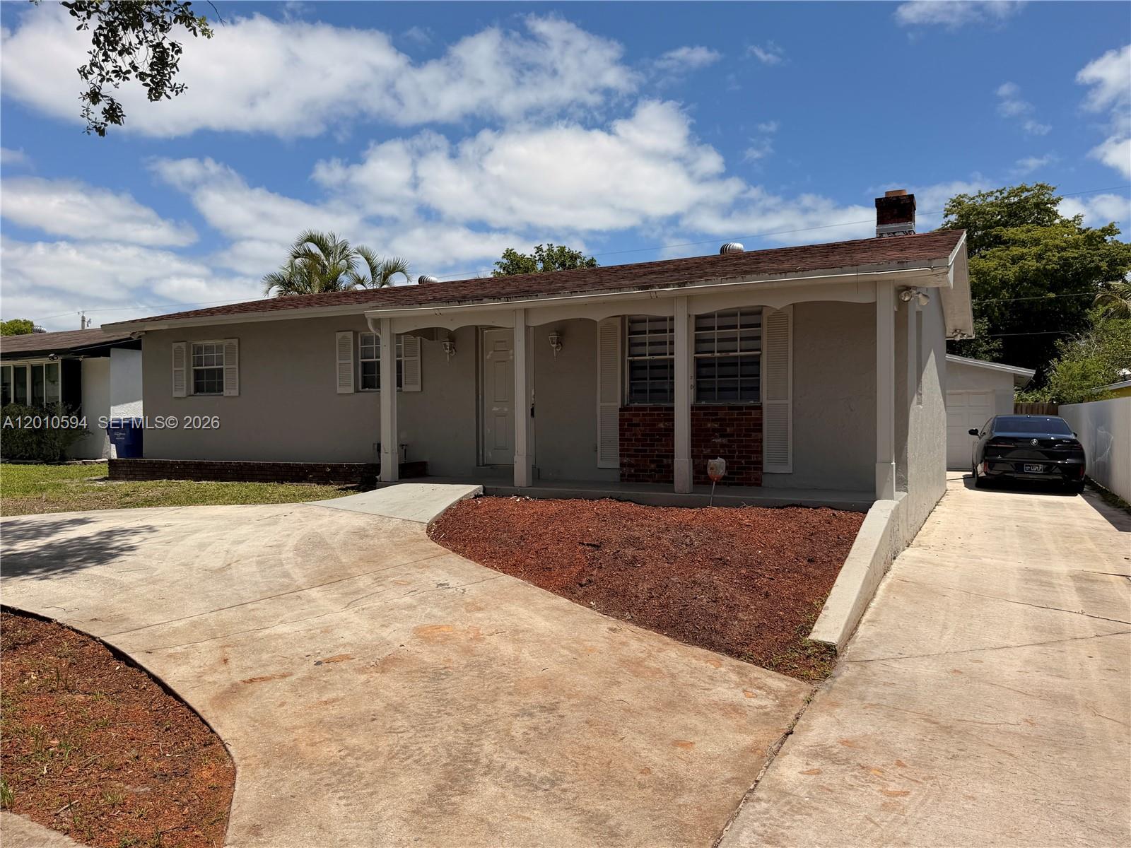 **SELLER OFFERING $5,000.00TOWARDS BUYERS CLOSING COSTS** FRESHLY REMODELED 4/3 IN BEAUTIFUL HOLLYWOOD. THIS PROPERTY OFFERS A LARGE DETACHED GARAGE WITH FULL APARTMENT/EFFICIENCY  INCLUDING BATHROOM AND KITCHEN. SET IN A HIGHLY CONVENIENT CENTRAL LOCATION, THE PROPERTY IS FULL OF POTENTIAL. THE INTERIOR FEATURES TWO WELCOMING LIVING AREA HIGHLIGHTED BY A CLASSIC FIREPLACE AND NEWLY INSTALLED DESIGNER KITCHENS. THIS HOME IS PERFECTLY POSITIONED JUST MINUTES FROM MAJOR ATTRACTIONS INCLUDING THE SEMINOLE HARD ROCK HOTEL & CASINO, FORT LAUDERDALE–HOLLYWOOD INTERNATIONAL AIRPORT, AND THE AREA’S BEAUTIFUL BEACHES. CONTACT LISTING AGENT FOR SHOWINGS.