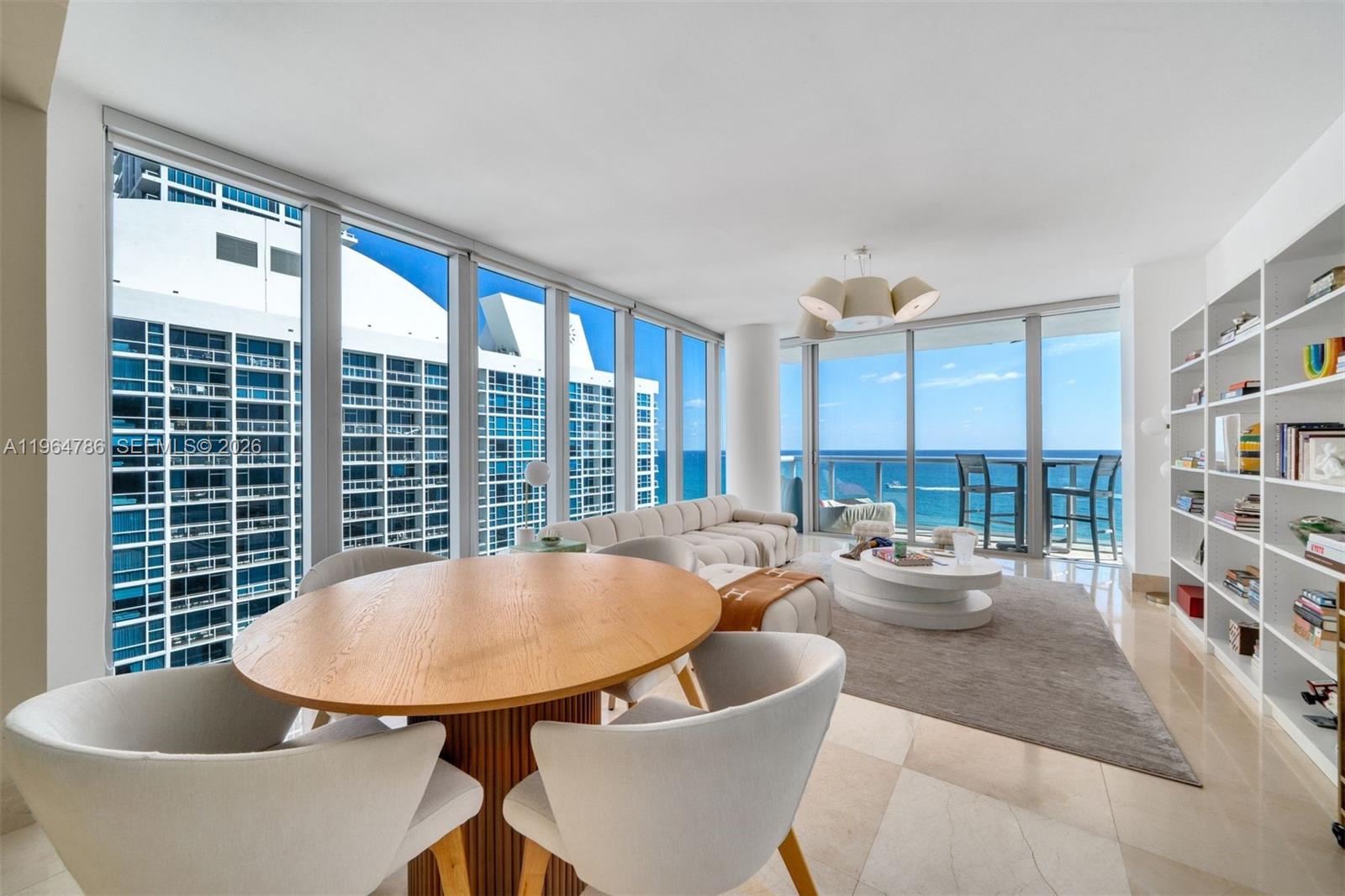 Bright oceanfront residence at The Carillon, where every room is filled with beach and Intracoastal views, with an ideal exposure that captures both sunrise over the ocean and sunset over the Intracoastal. This spacious 2-bedroom, 2-bath corner unit features a welcoming foyer entry and an open living and dining area that opens to a private balcony overlooking the ocean. The generous primary suite offers its own balcony access, dual vanities, a soaking tub, and a separate glass-enclosed shower. The second bedroom is privately set off the hall with its own bath and a separate balcony with Intracoastal and city views. A chef’s kitchen with premium appliances completes the space. Enjoy access to The Carillon’s world-class amenities, including a 70,000 sq. ft. spa, state-of-the-art fitness center, beach service, on-site dining, and a full calendar of wellness classes. An exceptional opportunity to live in Miami Beach’s premier wellness lifestyle destination.