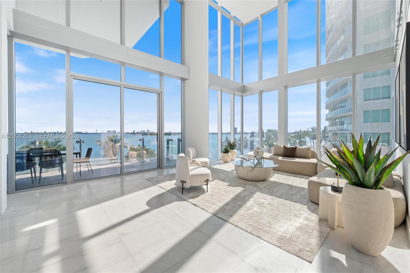 Be the first to live in your two-story dream residence at Missoni Baia! This townhouse-style brand-new construction with elevator access to both floors offers modern design, incl. marble floors/counters and Wolf/Sub-Zero appliances. Enjoy unobstructed bay views through floor-to-ceiling windows and on your private balcony. This expansive duplex features four bedrooms, plus an open den/study and staff quarters as additional luxury room options. Missoni Baia's resort-style amenities include an infinity-edge pool, spa, fitness center, social lounge, game room, tennis court & more. Located in the heart of Edgewater, Missoni Baia provides easy access to the city’s vibrant energy, while offering serene waterfront living. Design District, Wynwood, Brickell, Miami Beach and Miami airport are just moments away.