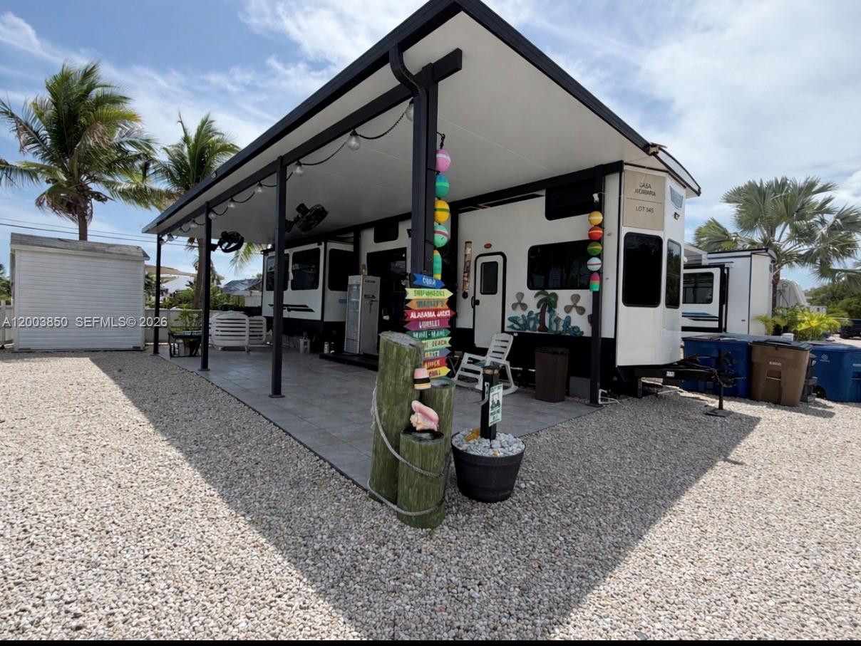 Own Your Own Piece of Paradise in Key Largo!

Welcome to your slice of the Florida Keys, located in a desirable private, gated community in beautiful Key Largo. This amenity-rich neighborhood offers everything you need for both relaxation and recreation, including 24-hour security, a private boat ramp, children’s park, basketball courts, tennis courts, racquetball and pickleball courts, laundry rooms and a community pool
One of the standout features of this community is that it is among the few in Key Largo that allow short-term rentals, making this property not only a personal getaway but also an excellent income-producing investment opportunity.
Situated on a desirable corner lot, this property includes a 2022 Forest River Grand Lodge featuring 1 bedroom, 1 bathroom, and two upstairs lofts, providing ample space for guests. The lot is large enough to accommodate all your toys, a large boat and jet ski-perfect for enjoying the Keys lifestyle.

Additional highlights include:

    •    Washer and dryer

    •    Shed

    •    Access to a recreation hall available for private events and gatherings

Whether you’re looking for a vacation home, an investment property, or both, this is a rare opportunity to own in one of Key Largo’s most sought-after communities.