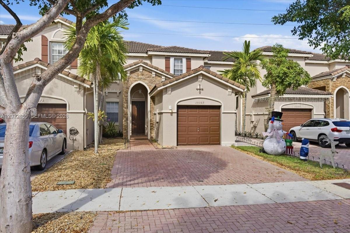 Beautiful and spacious townhouse located in one of Miami’s most desirable areas! This 3-bed, 2.5-bath home offers an excellent layout with a flex room in the garage that can be used as a bedroom, office, playroom, or gym. Enjoy peace of mind with a brand-new A/C unit and new appliances, giving the home a fresh and updated feel. Featuring 1,778 sq ft of living space, this property offers generous common areas, comfortable bedrooms, and great natural light throughout. Built in 2004, the home has been well maintained and is move-in ready. Nestled in a quiet and enjoyable community, you’ll love the convenient location—just minutes from shopping, dining, top schools, major highways, parks, and public transportation. Ideal for families, first-time buyers, or investors looking for a strong rental area. Don’t miss the opportunity to own this fantastic townhouse in a high-demand Miami neighborhood. Easy to show—schedule your showing today!