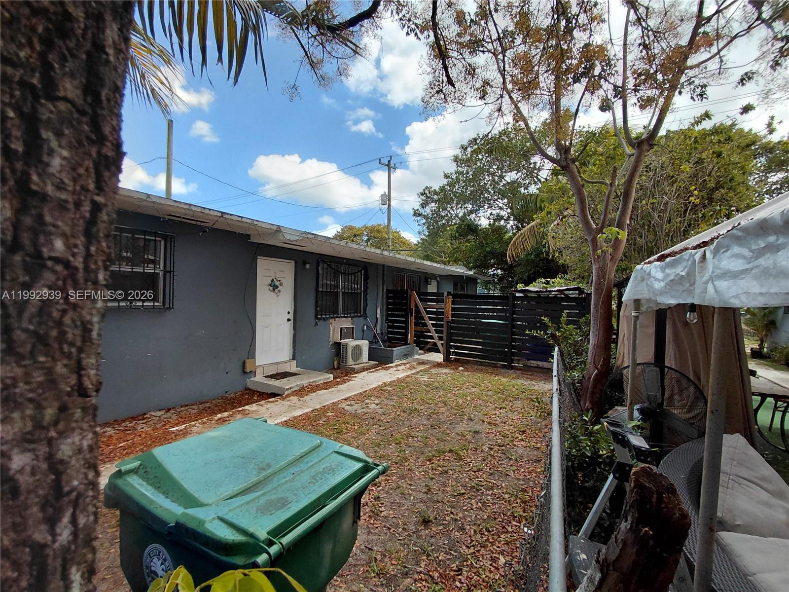 4-Bedroom 2-Bathroom duplex near Design District with plenty parking, offering modern design, strong income potential, and with possibility to live in one side and rent the other! Nice Kitchen, Tile Floors, 2 Central AC's, Laundry Room. Located near Allapattah/Buena Vista near the Design District and minutes to Downtown and Miami Beach. This residence features a total of 4 bedrooms and 2 bathrooms, thoughtfully designed with open-concept floor plans, tile flooring throughout, and abundant natural light. Unit 1262: 2 Bedrooms | 1 Bathroom Modern kitchen with quality countertops, newer appliances, and custom cabinetry. (Leased MTM) Unit 1264: 2 Bedrooms | 1 Bathroom Private entrance and carport parking, offering privacy and flexibility. Property Features: • Laundry Room • 2 Private Yards • 2 Separate Fenced Parking Areas • Water Heaters in each unit • Energy-Efficient Systems • 2 Private Storage Areas (one per residence) • Aluminum Modular Fence • T3-0 DUPLEXES ZONING. Ample on-site parking with capacity for multiple cars or work trucks, ideal for residents, tenants, or business use. Perfect for investors seeking rental income or homeowners looking to live in one unit and rent the other. High-demand rental area with convenient highway access and approximately a 15-minute commute to most major Miami destinations. Don’t miss this opportunity to own income-producing duplex! More pictures and videos available upon request. Showings by Appointment. 2 Electric Meters.