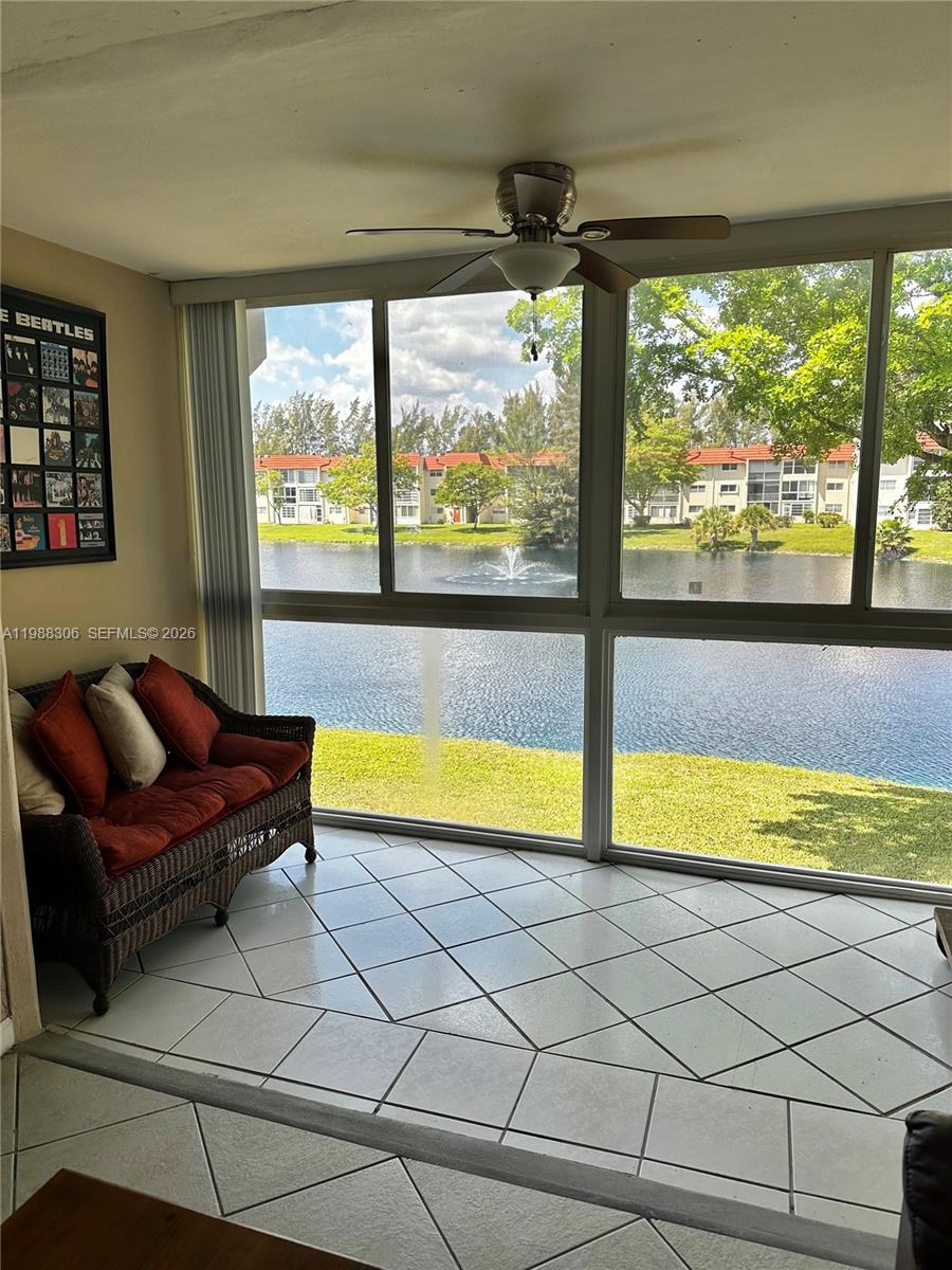 Reduced !! Great 2 bedrooms, 2 bathrooms with 2 Bathroom showers Condo at Sunrise Lakes I. Lake/fountain view from enclosed patio that has clear hurricane wind resistance glass and windows, All tile floor except closets, upgrades kitchen: newer appliances, countertop, backsplash, lights. All paint neutral inside. Great condition, Ceiling fans and upgraded front door. Close to shopping areas, restaurants, transportation.