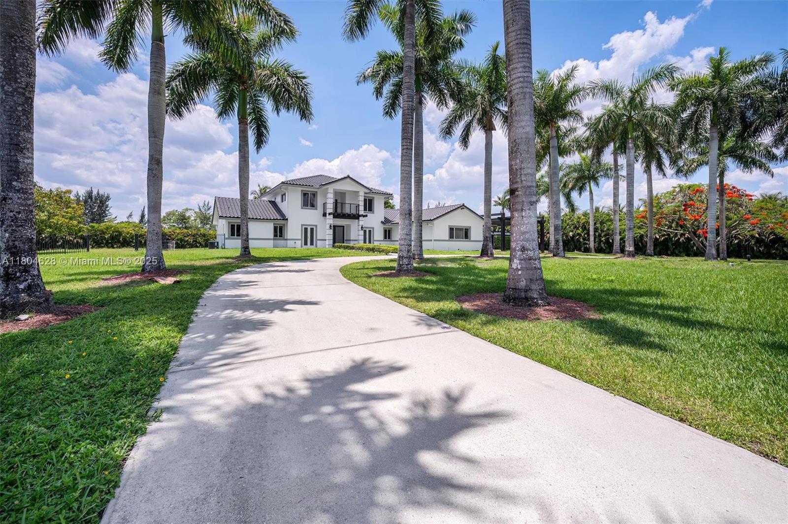 Luxurious Southwest Ranches Estate, 2.5 acres approximately in a private gated lot.  Main House and guest house.  Chef kitchen, new A/C unit, high impact windows.  Beautiful pool and patio with built in BBQ. Sauna in the master bathroom.