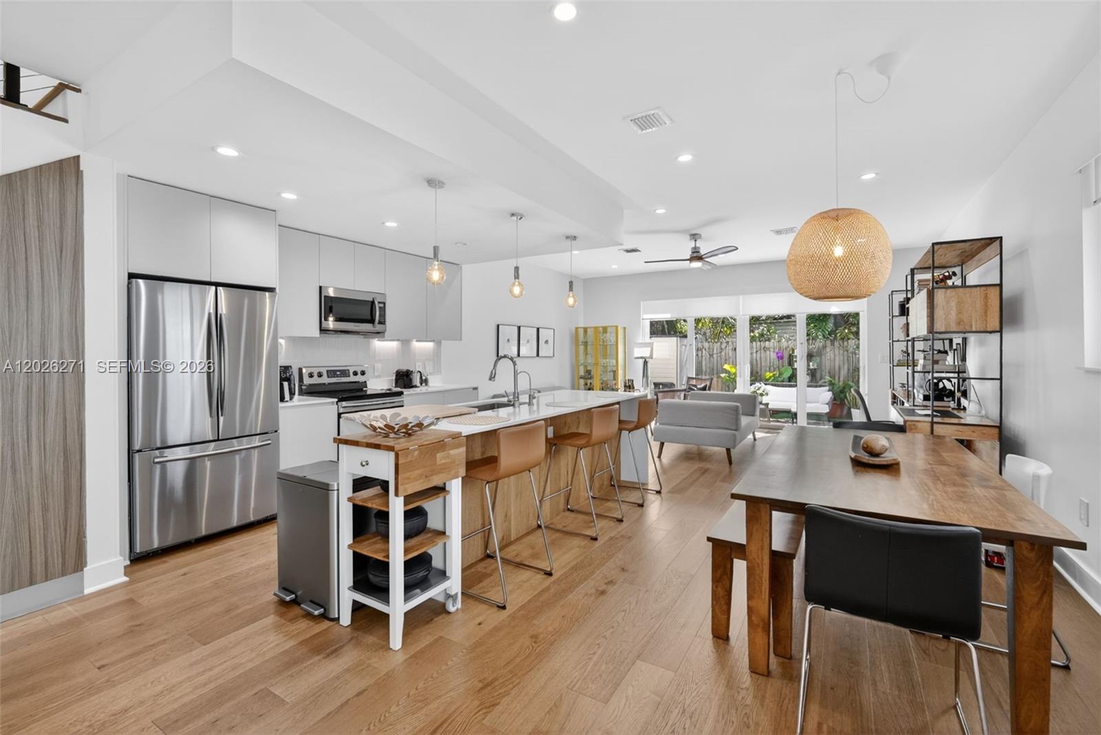 Beautiful newer construction built in 2019 offering bright, open living spaces with large windows, abundant natural light, and a freshly painted interior. This well-maintained fee simple home with no HOA features spacious closets, private entrance, beautiful and private patio, plus a finished oversized garage with A/C. Attached to only one neighboring residence, the home seamlessly combines comfort, sophistication, and functionality through its thoughtfully designed layout. Ideally located within a short walk to Riverwalk Fort Lauderdale, the Water Taxi, Broward Center for the Performing Arts, AutoNation IMAX 3D Theater, Brightline station, supermarkets etc... Convenient access to Fort Lauderdale–Hollywood International Airport, I-95, and 595. A rare opportunity to enjoy comfort, style, and unbeatable convenience in one of Fort Lauderdale’s most desirable locations.