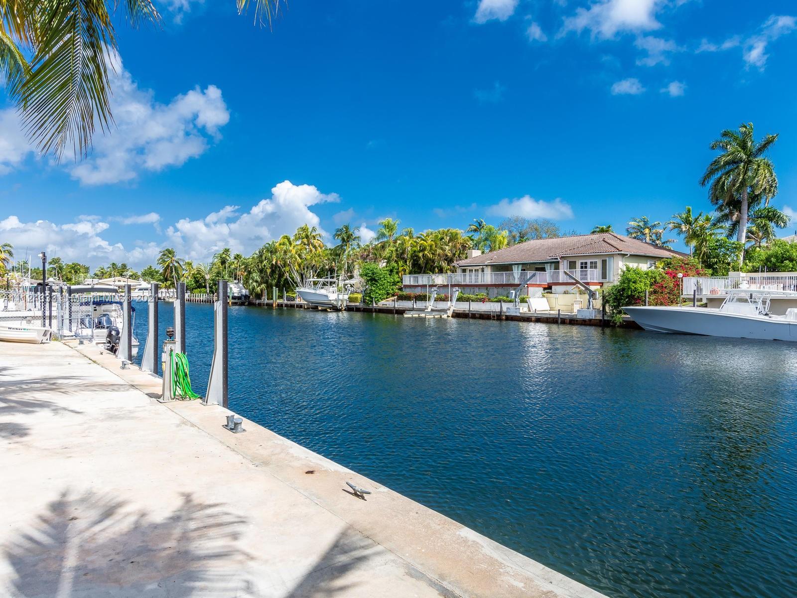 Your key to “Paradise” with 100' Direct Ocean Access on wide, protected waterway in coveted Gables by the Sea guard-gated community along Biscayne Bay. Single story 4BD 3BA contemporary pool home with 3134 ASF open floor plan, screened pool & deck, wood floors throughout with 2-car garage on quiet tree-lined cul de sac Deva St. Pedestrian-friendly tree-lined 20 mph streets in top rated Pinecrest school district. Avail for 6-month lease.