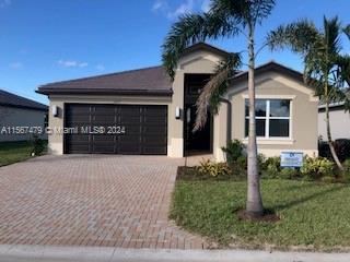 Beautiful home in Valencia Grove! GL Homes Age 55+ award winning active adult community. 3 Bedrooms 2 Bathrooms and a 2 car garage. This community features a resort style pool, clubhouse, arts and cultural center, fitness faculty, Paseo Greenway and a sports and racquet club! Close to Tradition for shops and restaurants.  Close to Cleveland Clinic Medical Center.  This home comes with impact windows, a screened porch, a security system, and no one living behind you!