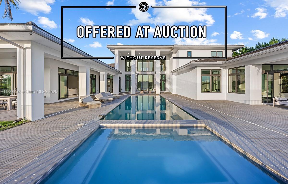 LUXURY REAL ESTATE AUCTION on-site on Monday, November 17th, 2025, at 11:00 AM. Previews begin on Saturday, October 25th, and will run every Saturday and Sunday from 1:00 to 4:00 p.m. until the auction. Private appointments are available; please call for details. Zen-inspired estate in Windmill Reserve with 9,019SF on a 28,172SF lot backing protected greenspace, no rear neighbors. 7 ensuite bedrooms, 8.5 baths. Chef's kitchen: Thermador appliances, large quartz island, gas cooktop, wall oven, butler's pantry, wet bar. Primary suite: dual walk-ins, sitting area, spa bath with soaking tub inside glass shower. Wine cellar, media room, loft, smart gym. 4-car garage and security. Outdoors: 60x16 saltwater infinity pool, heated spa, covered lanai, custom swings, pad for future summer kitchen.