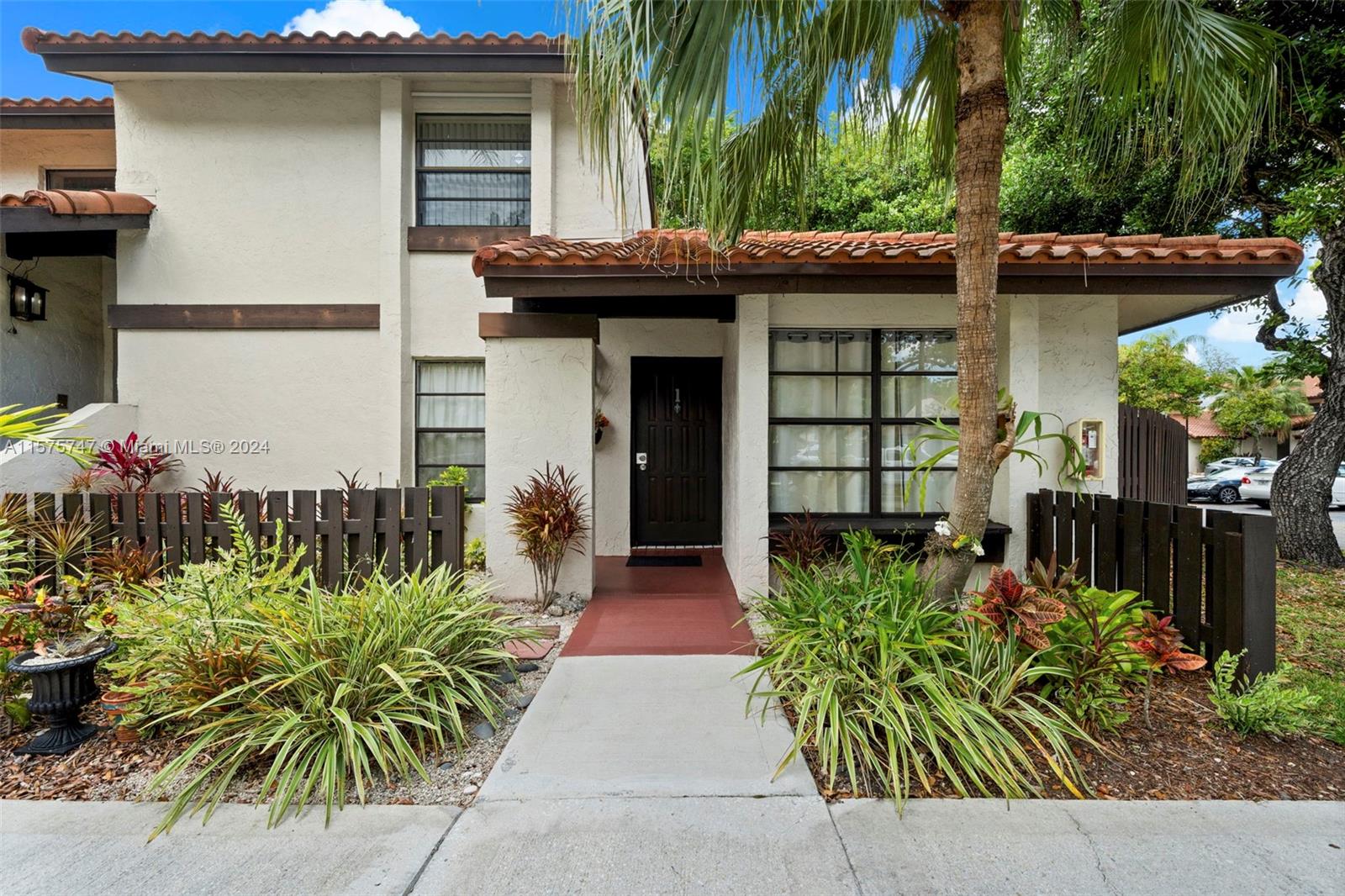 COME SEE THIS BEAUTIFUL UPGRADED CONDO.  This is a 1st floor corner unit, a rare find in The Crossings.  It has 2 large bedrooms & 1 1/2 bathrooms.  Spacious bedroom closets, 2 storage closets & a separate laundry area.  The bathrooms & kitchen have granite countertops, & soft-close cabinetry/drawers.  It has a tiled wrapped around patio & beautiful landscaping.  Residents have access to the Country Club with heated olympic pool.  There's also a main pool, tennis courts, gym, playground, social room & walking trail.  This property is located within walking distance from the Publix, CVS, & restaurants.  It's also conveniently located near schools, stores, & main roads.  Property is NOT located in a flood zone.  Building has been rated for wind mitigation.  Monthly maintenance $540/HOA $81.