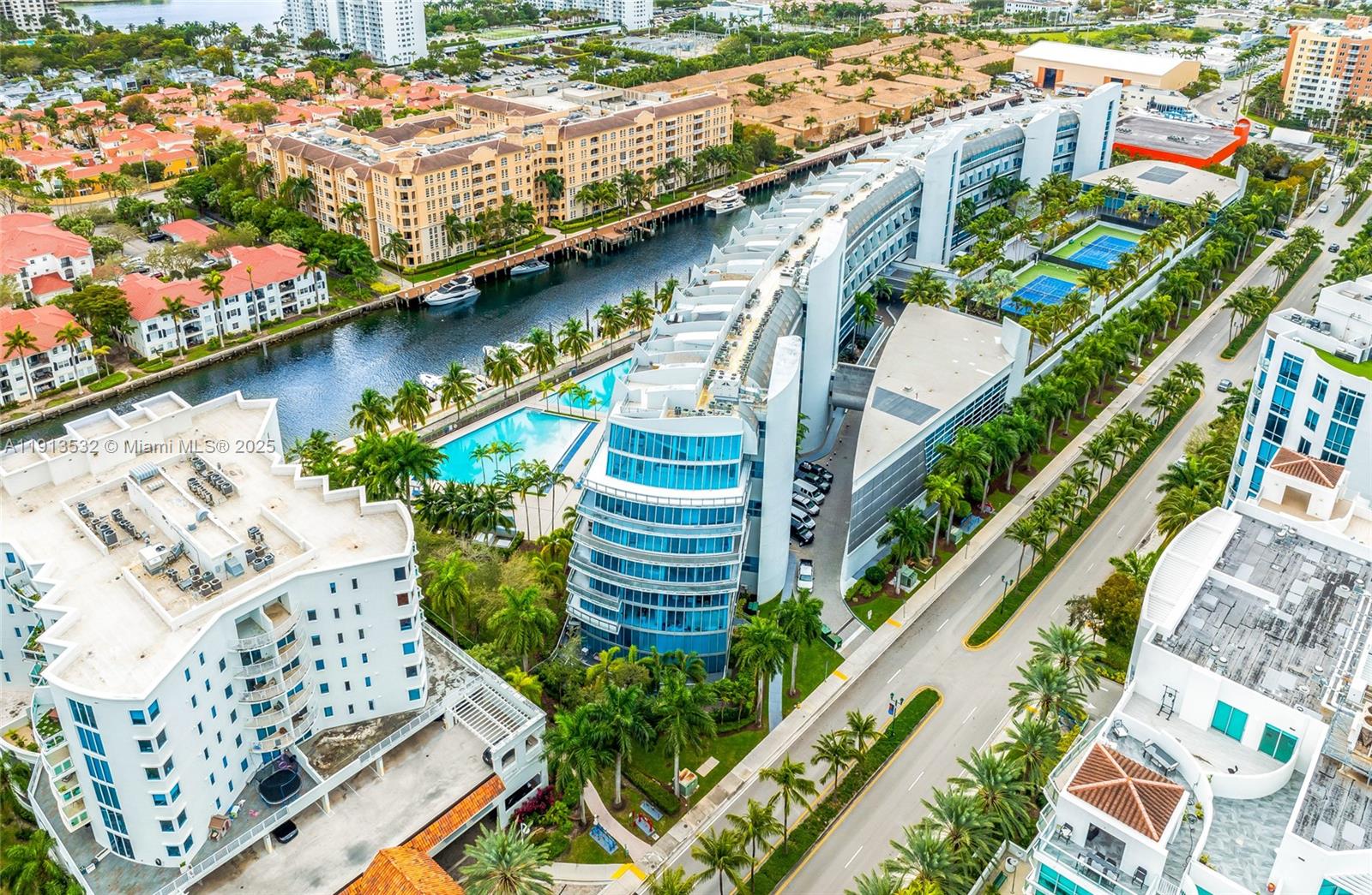 Experience luxury living in this modern tri-level penthouse with a private rooftop terrace at the prestigious Artech Aventura. This 5-bed, 5.5-bath home showcases floor-to-ceiling impact windows with breathtaking intracoastal and ocean views. The second level offers a grand living area, gourmet kitchen with Sub-Zero & Miele appliances, formal dining, and junior suite. The first level hosts two en-suite bedrooms, while the third features a loft, master suite with office/sitting area, and an additional bedroom. Enjoy resort-style amenities—valet, tennis, and 24-hour security. 120 ft boat dock sold separately.