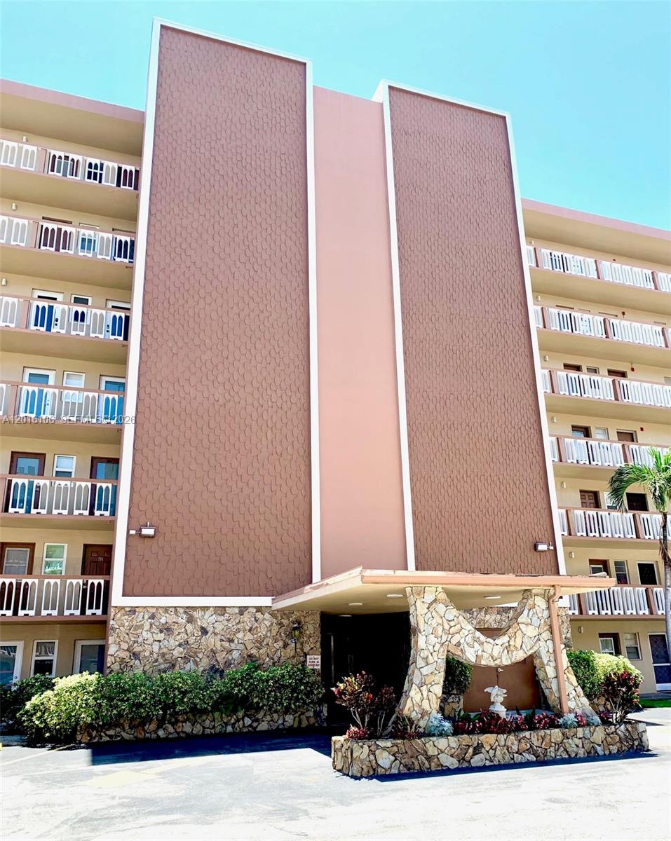 Move in condition, beautiful corner apartment in the heart of Hallandale Beach with updated kitchen with SS Appliances, granite countertops, newly tiled floors and Impact windows. Ready to move in, Low HOA, centrally located, walking distance to shopping centers.
