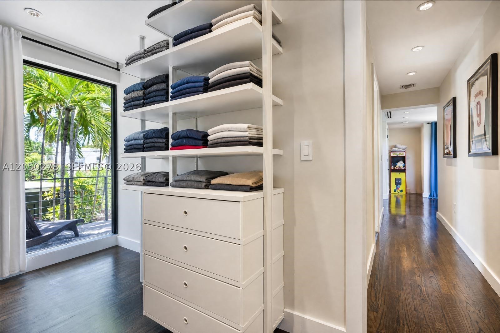 $2,950,000 | 3 Bed | 2 Bath | Pool | Guest Room

Miami Beach living, elevated.

Resort-style pool and spa, sun-drenched open living, spa-inspired primary suite, and a private guest room — all just minutes from the beach. A rare blend of comfort and contemporary design.


Welcome to 1548 Biarritz Drive, a stunning contemporary residence offering true resort-style living in Miami Beach.

Enjoy a private pool and spa combo set in travertine decking, surrounded by lush landscaping and turf — perfect for entertaining or unwinding. Inside, an oversized great room features a custom media wall, wood-slat paneling, and floor-to-ceiling glass framing tropical views. The dining area, anchored by a marble table and sculptural chandelier, flows seamlessly for effortless entertaining.

The primary suite offers a spa-like bath with a dual floating vanity, marble slab walls, and private balcony access. A generous walk-in closet includes custom built-ins and an in-closet washer/dryer.

Rich hardwood floors, recessed lighting, and curated design touches run throughout — a home built for both comfort and style.

Let me know if you'd like it even shorter, or if you can send bedroom count, guest house, and driveway photos so I can round it out fully.