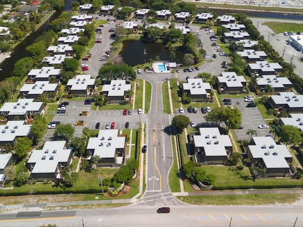 Don't miss this opportunity!!! Welcome to your new home, gated community. This beautiful updated 2 bedroom, 2 bathroom townhouse. NEW ROOF 2024. Freshly painted, ceramic floor,Low HOA, no application fee. The fenced patio provides a private space to relax.Close to Palm Beach State Collage, Restaurants, Supermarkets and Major Roads.