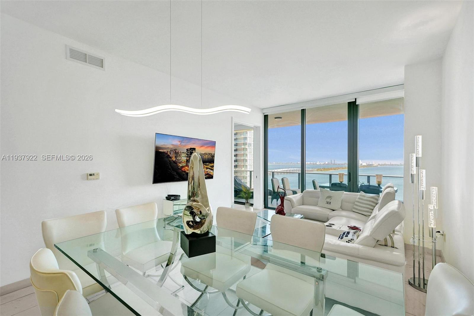 Stunning 2-Bedroom + Den / 2.5 Bathroom Residence at Gran Paraiso – Fully Furnished. Unit 1705 features floor-to-ceiling windows with Biscayne Bay and city views, a modern open kitchen with premium appliances, custom closets, and a spacious private terrace. Includes 1 assigned parking space. Pet-friendly building offering resort-style amenities: bayfront pool, spa, fitness center, tennis courts, bowling alley, game rooms, wine cellar, kids’ playroom, concierge and 24-hour security. Prime Edgewater location near Midtown, Wynwood, and the Design District.