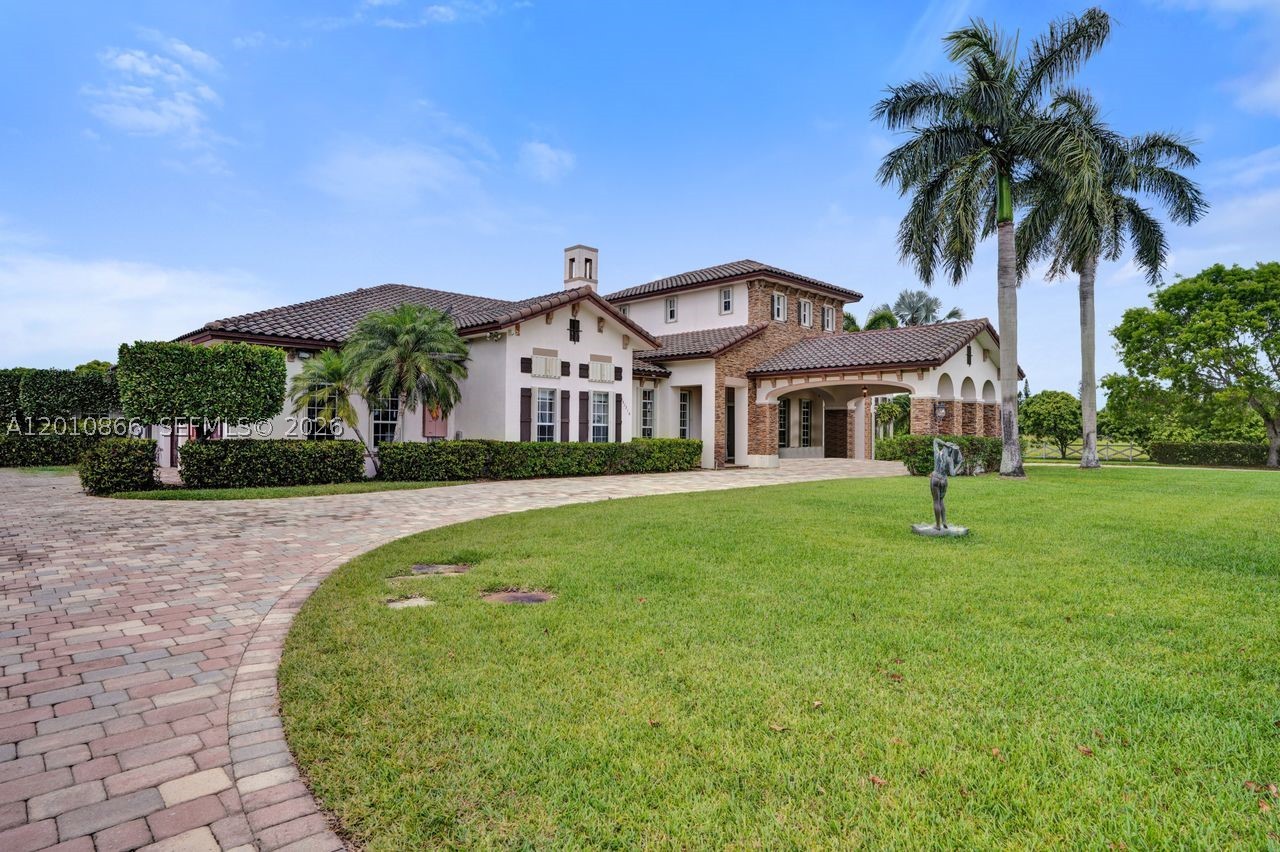 Welcome to a rare offering in the exclusive gated enclave of Savannah Ranch Estates. Set on 5 pristine acres, 31310 SW 215th Ave is a grand 5,497-square-foot estate blending luxury, privacy, and exceptional lifestyle appeal. This expansive residence features 5 bedrooms and 4.5 bathrooms, with a thoughtfully designed layout ideal for both elegant entertaining and comfortable everyday living. Outdoors, the property is equally impressive, offering a resort-style pool, outdoor kitchen, and the space to enjoy South Florida living at its finest. A 3-car garage adds convenience and functionality, while the sprawling grounds provide a sense of seclusion rarely found. Adding to the property’s unique value is an income-generating nursery located at the rear of the estate, creating a rare opportunity for supplemental revenue, agricultural use, or long-term investment potential. With the security of a gated community, low HOA fees, and a setting that combines luxury living with acreage and income potential, this is a truly distinctive estate in one of Homestead’s most desirable communities.
