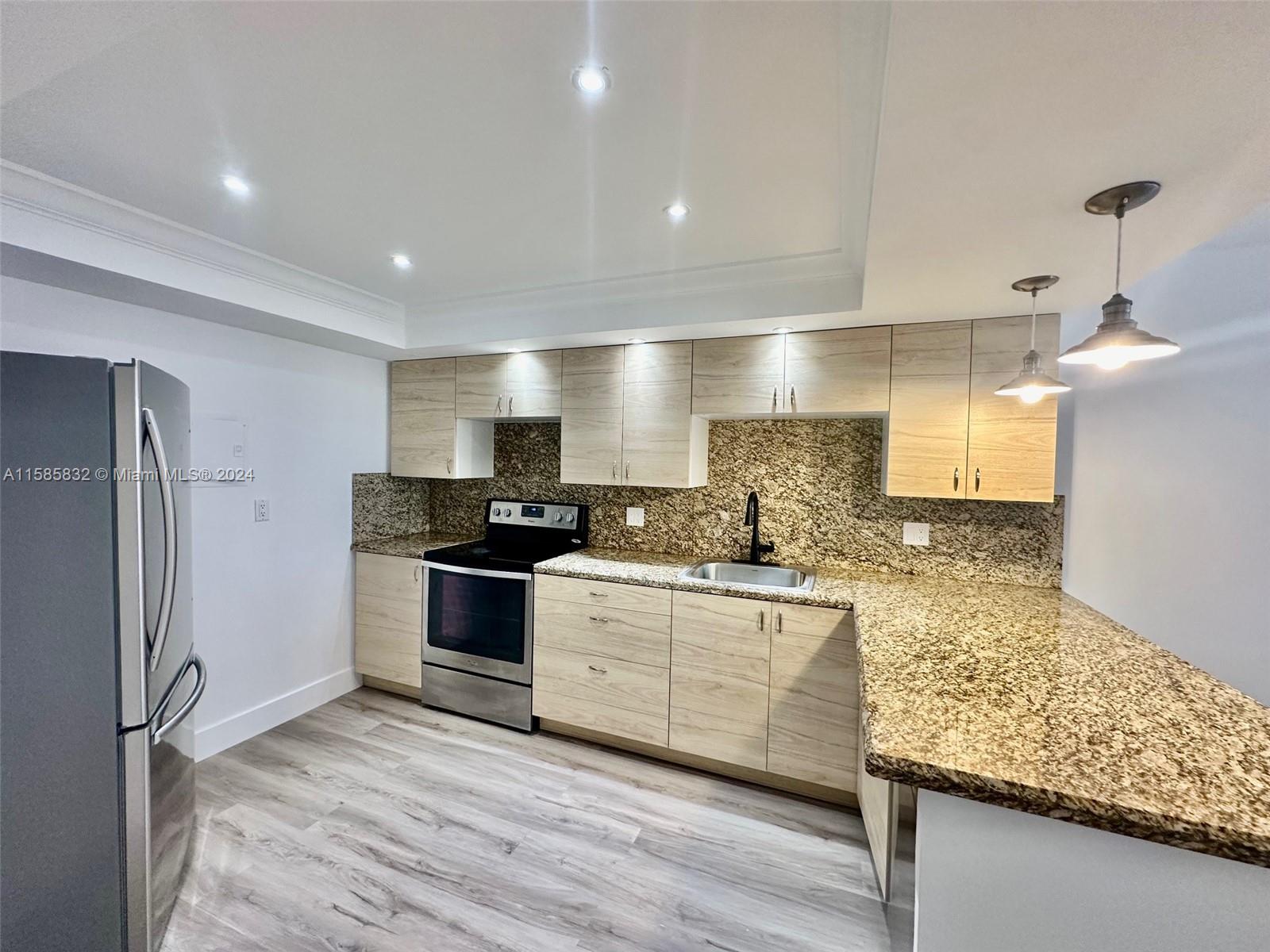 This completely renovated condominium features one bedroom and one bathroom. Open concept kitchen with stainless steel appliances, and a spacious layout. Enjoy the convenience of an assigned parking space and a private balcony with hurricane-impact sliding glass doors and a stylish railing. The community offers two large swimming pools and is perfectly situated with easy access to major highways including I-95, Palmetto Expressway, Florida Turnpike, and Biscayne Blvd. Just minutes from Aventura Mall, Sunny Isles, and Hollywood beaches. Walking distance to grocery stores, banks, and a wide variety of restaurants.  Vacant and easy to show.