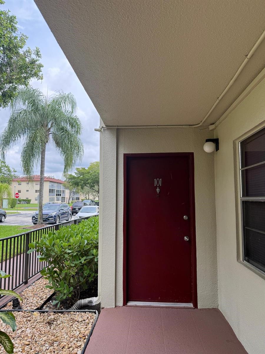 Seller is open to reviewing and negotiating offers. Move-in ready 2BR/2BA FIRST-FLOOR CORNER unit in New Hampton at Century Village! Bright and spacious layout with updated kitchen cabinets and tiled flooring throughout. Enjoy serene green space views from your screened balcony. Resort-style 55+ community with pool, gym, clubhouse, golf, shuttle & more. Prime Pembroke Pines location near I-75 and Pembroke Gardens. Don't miss this one!