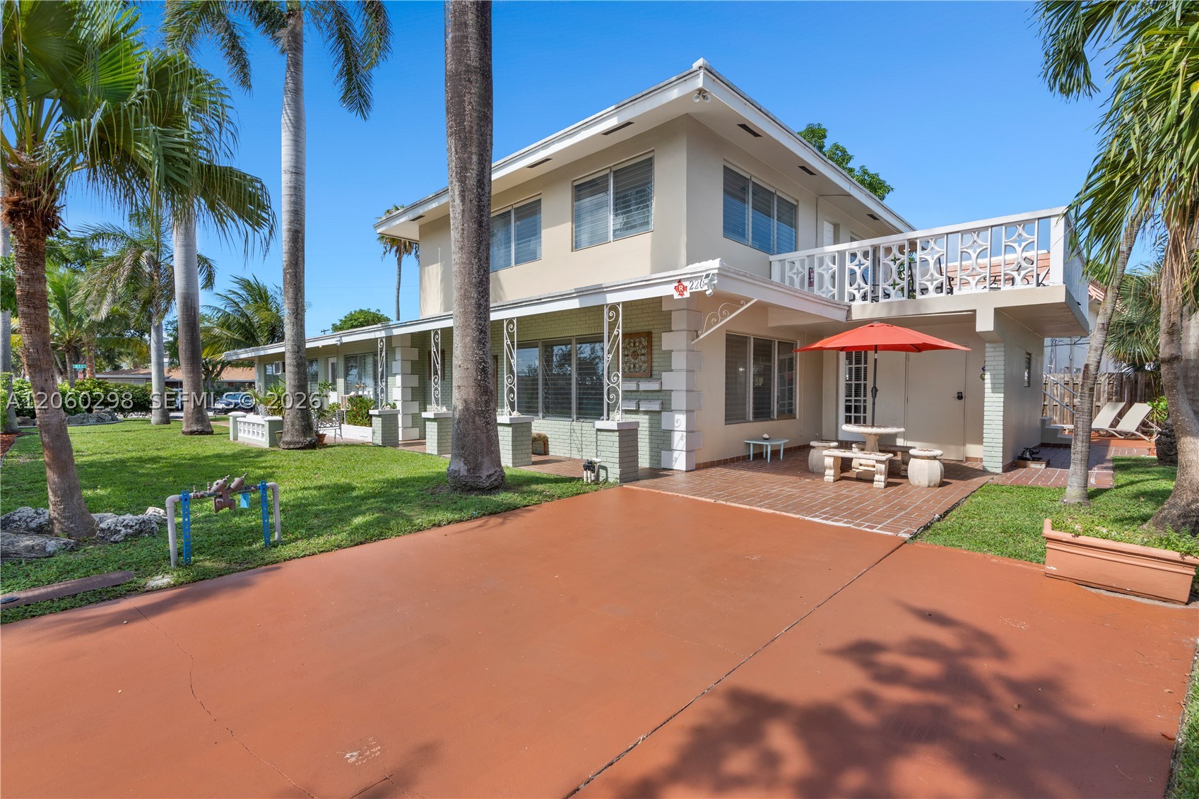 Amazing turn-key AIRBNB business! This income-producing 5-bed, 5-bath, 2,938 SF fourplex sits on a large corner lot JUST MINUTES TO THE OCEAN in Deerfield Beach's premier intracoastal neighborhood, "The Cove." Features a well-established vacation rental income stream & multi-platform online presence; active bookings convey. Offers 8 parking spaces, NO HOA, & NO restrictions - ideal for hosting large groups, wedding parties, or coastal retreats. Walk to grocery stores, cafes, restaurants, and waterfront dining like the iconic The Cove Waterfront & Tiki Bar. A rare money-making investment, just a short walk to the beach in the heart of Deerfield Beach!