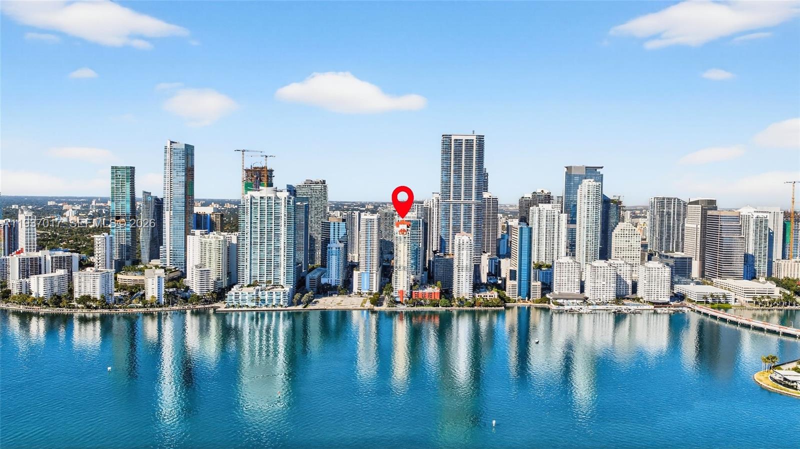 This 2-bedroom, 2-bath residence offers unobstructed balcony views of Biscayne Bay and the Brickell skyline. The split-bedroom layout provides privacy and functionality, while floor-to-ceiling natural light, tile flooring, and a modern kitchen with stainless steel appliances deliver clean, living room space. Rent up to 12 times per year, making this an ideal asset for short-term flexibility, vacation home or annual lease. Located steps from Brickell City Centre shopping, top restaurants and nightlife, this unit offers true walkability in Miami’s most active urban core. If you prefer to stay at home, the Mark building is one of Brickell’s most amenity-packed waterfront buildings, featuring a bayfront pool deck, hot tub, tennis and pickleball courts, indoor racquetball court, fitness center, sauna, billiards room, and on-site convenience store. A rare opportunity for owners seeking water views, location, amenities, and a proximity to a lively Brickell. Come check it out for yourself