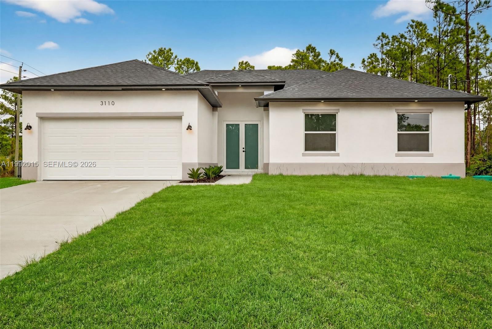 Seller offering assistance with buyer's closing costs! MOVE-IN READY new construction! This stunning 3-bedroom home with a versatile den/office offers 2 full bathrooms and a spacious open-concept layout. The primary bedroom features a private bathroom and a walk-in closet. Enjoy modern finishes throughout, including high ceilings, sleek tile flooring, quartz countertops, and stainless-steel appliances. The home also features LED mirrors in the bathrooms, built-in closet shelving, a dedicated laundry room with a sink, and a 2-car garage with epoxy flooring. Situated on a corner lot, enjoy added space and privacy, along with a covered lanai perfect for relaxing or entertaining. Conveniently located near major roads, shopping, and dining.