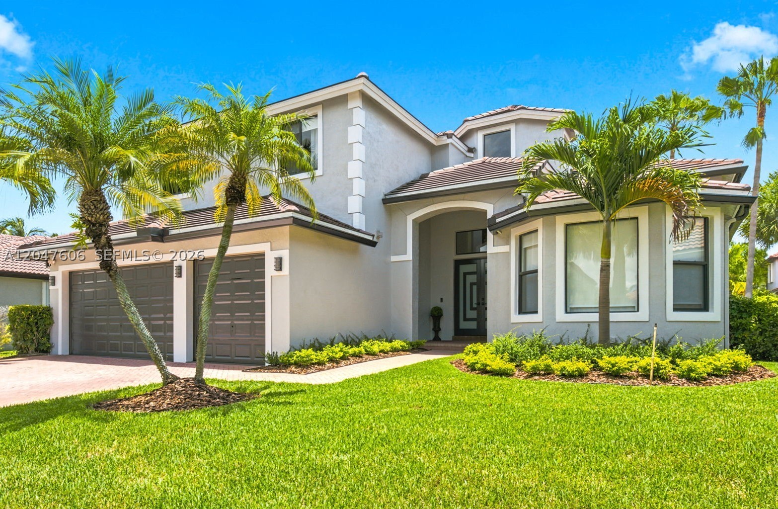 This meticulously maintained 6-bedroom, 5-bath home offers exceptional craftsmanship, designer finishes, and a thoughtfully designed floor plan for both everyday living and grand entertaining.  A dramatic two-story foyer welcomes you with soaring ceilings, marble-look porcelain flooring, and abundant natural light. The gourmet kitchen is beautifully appointed with quartz countertops, premium cabinetry, stainless steel appliances, and breakfast nook, all opening to spacious living and dining areas. Two first-floor bedroom and two full bath              (one is cabana bath) provide the ideal space for guests or multigenerational living.

The luxurious primary suite offers a spa-inspired retreat featuring a soaking tub, oversized walk-in shower, dual vanities, and two generous walk-in closets. Additional highlights include a striking glass staircase, designer lighting, updated bathrooms, game room, upgraded laundry room, 2023 tile roof, full impact windows and doors, and a 3-car garage.

Step outside to the covered lanai overlooking a beautifully landscaped backyard with ample room to create your dream pool and outdoor oasis.

Resort-style amenities including a clubhouse, resort-style swimming pool, sauna, fitness center, tennis courts, basketball courts, playgrounds, scenic walking b3autifyl walking paths. Conveniently located near top-rated schools, parks, shopping, dining, and major highways.