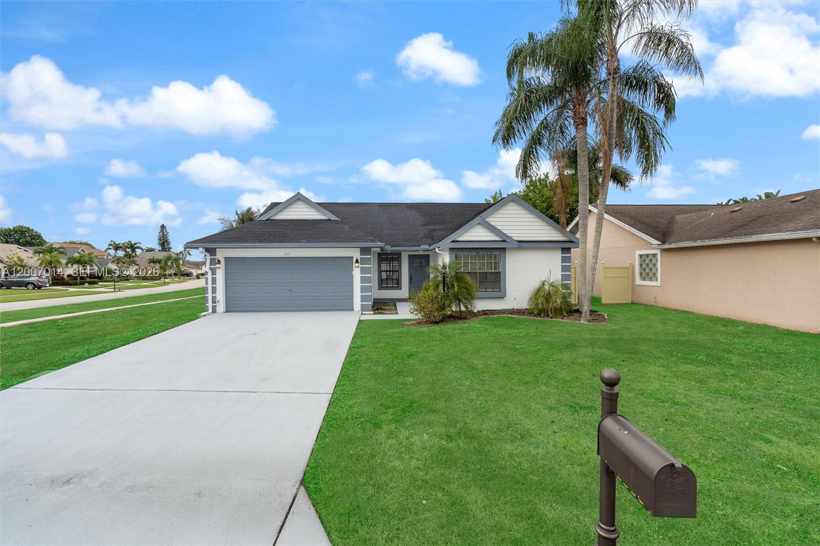 A rare opportunity to own a fully renovated home in this community. This move-in ready residence features an open-concept layout designed for comfortable everyday living and easy entertaining. The renovation was done with a clean, modern aesthetic that feels fresh yet timeless, with consitent finishes & throughtful updates throughout including a new roof.  Natural light enhances the flow of the home, creating bright & welcoming living spaces. Enjoy access to excellent Wellington schools, with elementary, middle & high schools just minutes away. Everyday conveniences is close at hand with Publix and other grocery options nearby and the community offer abundant parks, recreation, and famliy friendly amenities the surrounding area features nearby lakes and scenic water views, with outdoor recreation just minutes away.
