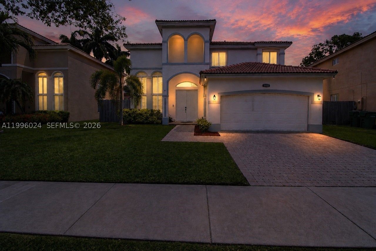 Discover the space, flexibility, and value of this 4-bedroom, 2.5-bath residence in a gated Homestead community. The thoughtfully designed two-story floor plan features a first-floor primary suite, offering added privacy and everyday convenience. Inside, volume ceilings, tile flooring, generous living and family areas, a separate laundry room, and abundant closet and storage space provide both comfort and functionality. The large backyard offers plenty of room for entertaining, outdoor dining, recreation, or creating a private outdoor retreat. Additional highlights include a two-car garage and a versatile layout well suited for daily living and hosting guests. Community amenities include a clubhouse, tennis and racquetball facilities, and 24-hour security patrol. The association fee includes cable, internet, and alarm monitoring. Conveniently located near schools, parks, shopping, dining, and the Florida Turnpike. Schedule your private showing and see the possibilities this home has to offer.