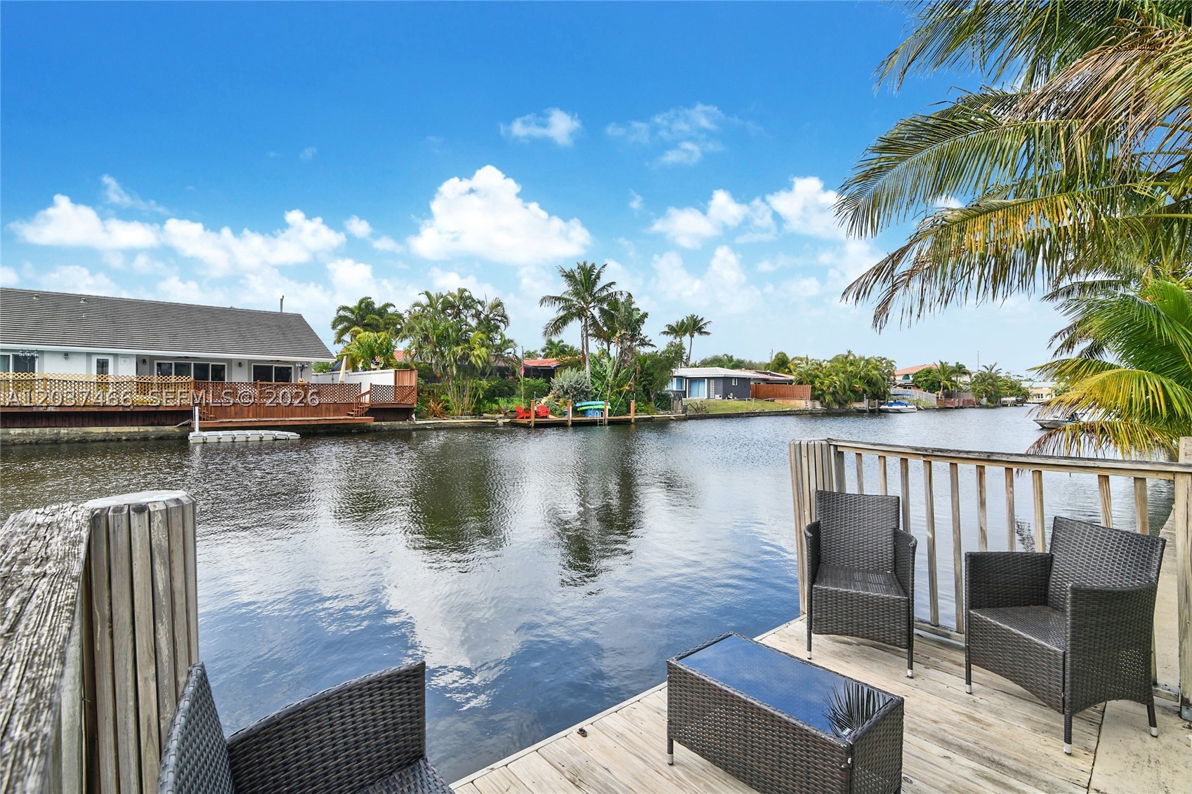 Spectacular waterfront, corner lot single family home in Wilton Manors with 2023 sqft living area space, 3 bedrooms and 2 bathrooms with an additional room. Open kitchen concept with a split bedroom layout and a tropical oasis vibe in the backyard. Terrazzo flooring throughout, indoor laundry, double car garage with additional storage space. Wonderful location. You will absolutely love this property. Don't miss this opportunity.