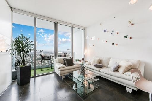 Incredible lower penthouse FULLY FURNISHED, high ceilings. Enjoy of unobstructed views with beautiful sunsets. The unit has everything you can possibly need. Tons of closet space. Call or text Jorge Ospina to schedule showings.