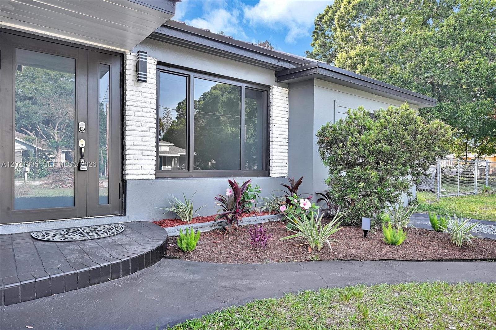 Welcome to this beautifully renovated 3-bedroom, 2-bathroom home situated on an oversized lot in a peaceful and established neighborhood. From the moment you arrive, you'll appreciate the modern updates, spacious layout, and incredible flexibility this property offers.

Inside, you'll find a stunning kitchen, fully remodeled bathrooms, recessed lighting throughout, and tasteful finishes that create a bright and inviting atmosphere. Every detail has been thoughtfully updated, making this home truly move-in ready.

The expansive lot provides plenty of room for boats, RVs, trailers, a future swimming pool, or even the potential to build a second residence. One of the home's most unique features is its flexible floor plan, which can easily function as a 2-bedroom, 1-bath main home with a studio-style efficiency featuring its own private entrance. Perfect for multigenerational living, guest quarters, home office, or potential rental income opportunity.

Conveniently located less than 2 miles from the marina and approximately 4 miles from beautiful Fort Pierce Beach, you'll enjoy easy access to boating, fishing, waterfront dining, and all the best of Florida living. The home is also just minutes from downtown Fort Pierce, local restaurants, entertainment, and newly developed shopping centers.

Whether you're looking for a primary residence, an investment opportunity, or a property with room to grow, this home offers unlimited potential in a prime location.