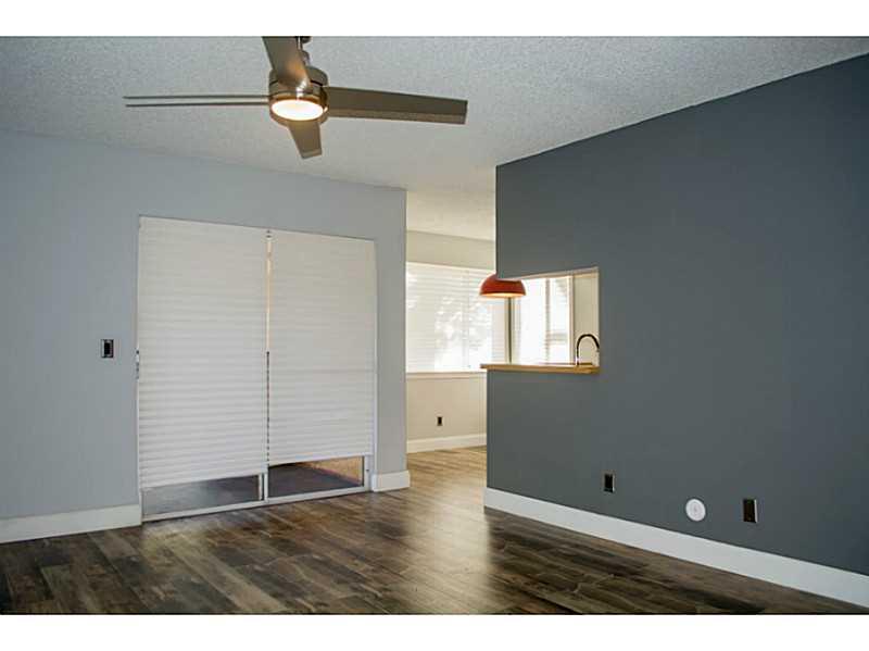 SPACIOUS AND REMODELED UNIT FEATURES GRANITE COUNTER IN KITCHEN AND BATHS, STAINLESS STEEL APPLIANCES, WOOD FLORS IN LIVING AREAS AND TILE IN KITCHEN , LAUNDRY ROOM AND BATHS. FRESHLY PAINTED, NEW BLINDS, FULL SIZE WASHER AND DRYER, WALK IN CLOSETS IN BOT H BEDROOMS, BIG BALCONY, A PLEASURE TO SHOW.